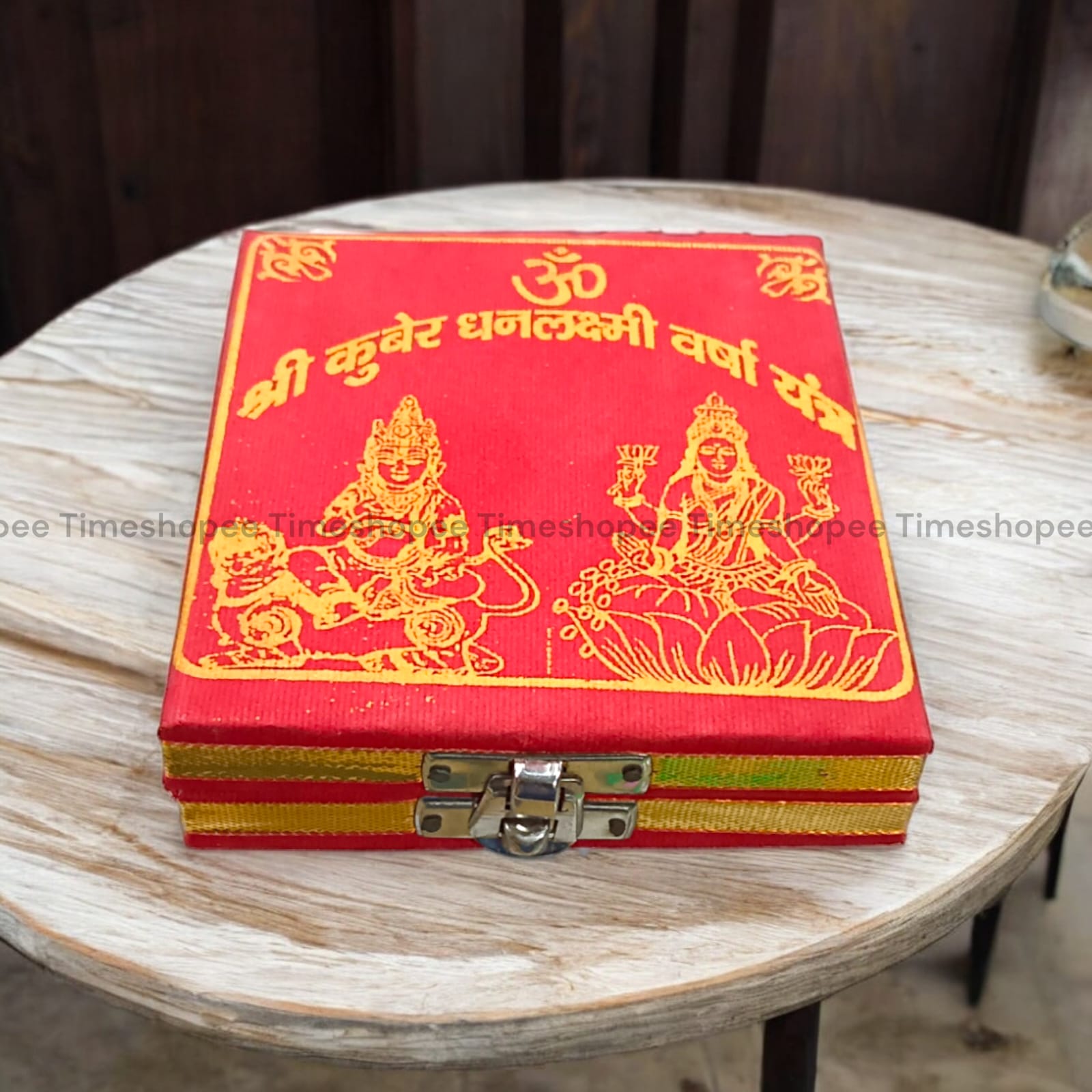 Lakshmi Kuber Box with various pooja items including idols, coins, yantra, and more, organized in a designed wooden box from Timeshopee