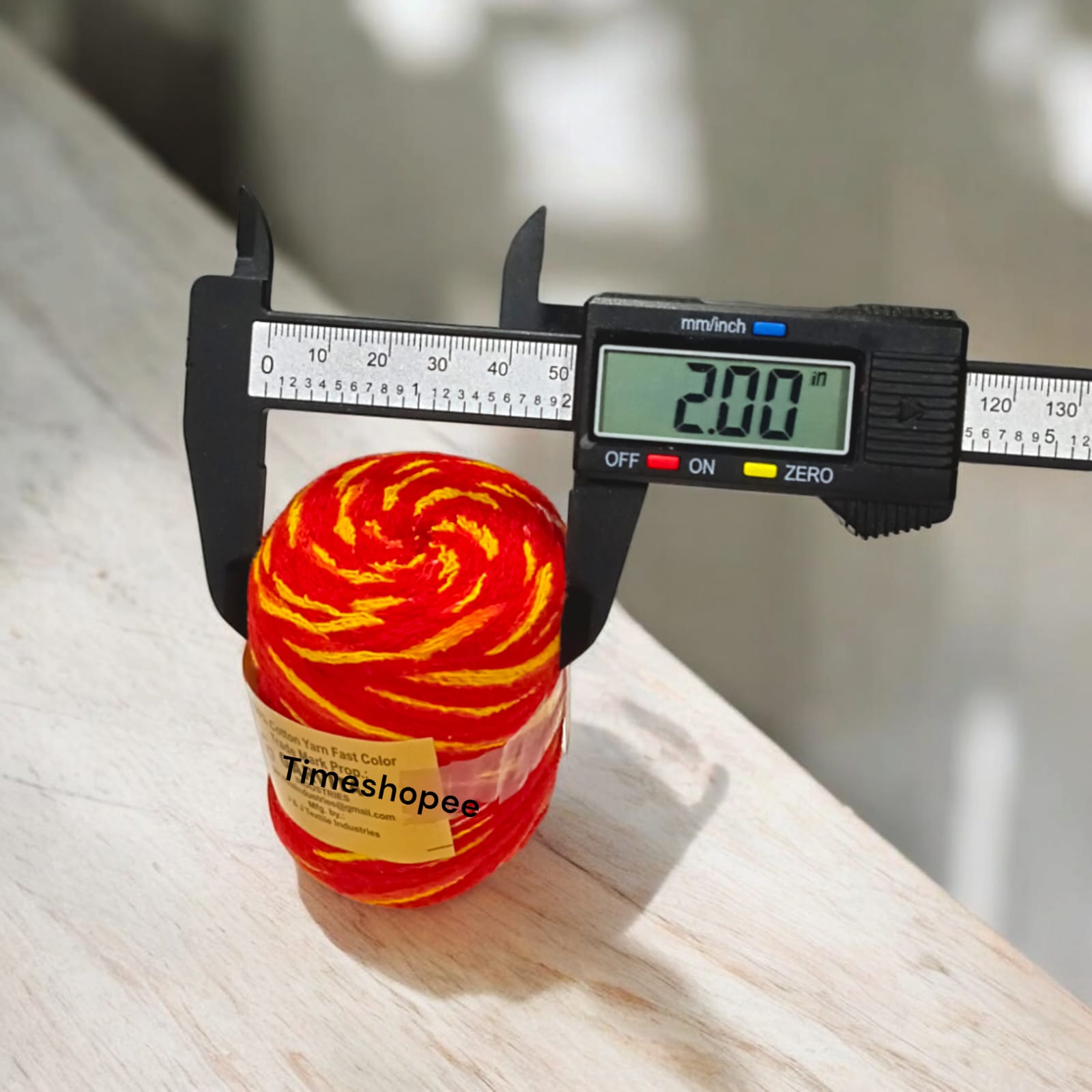 Large bundle of red moli kalawa, used in religious ceremonies for blessings and protection.