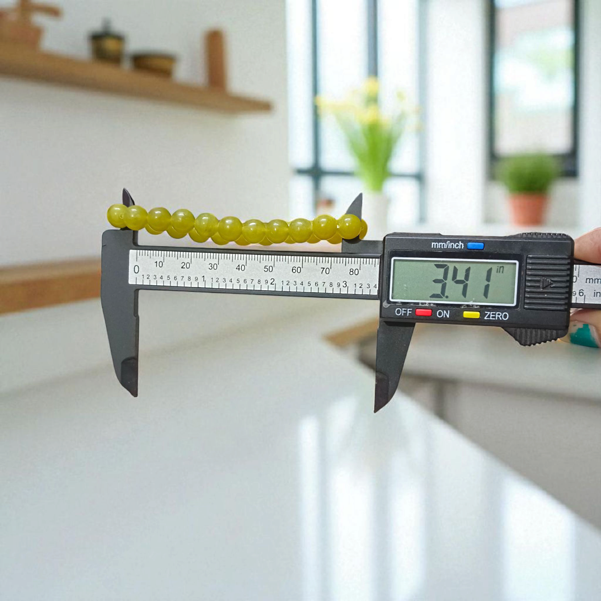 Light Green ONYX Bracelet with lab certificate, showcasing the elegant stretchable design and light green hue.