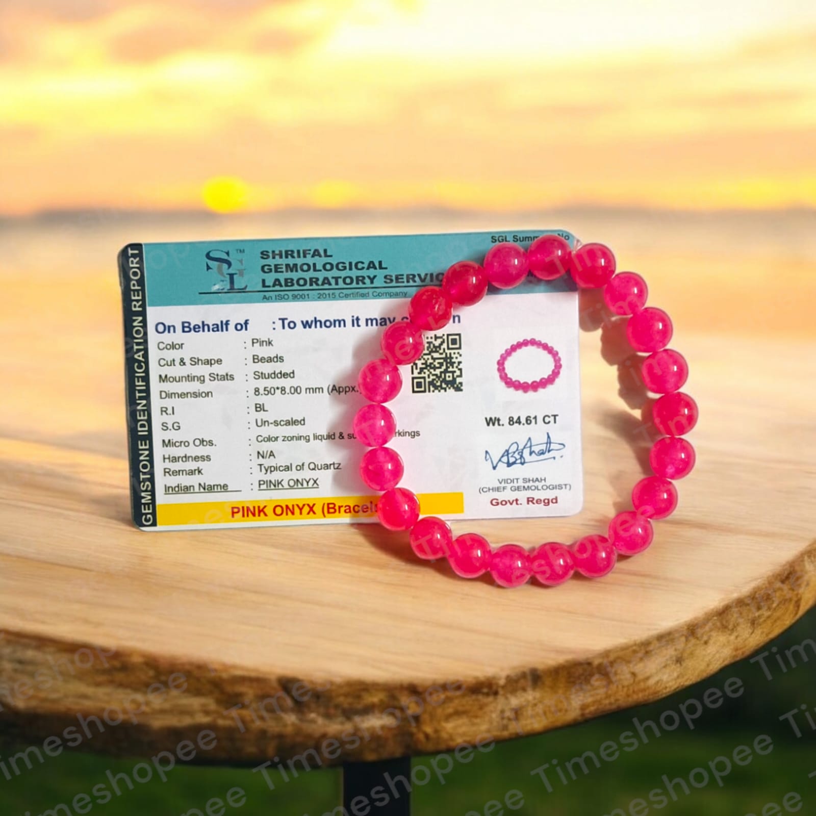 Light Pink ONYX Bracelet with lab certificate showing a close-up view of the elegant stretchable design.
