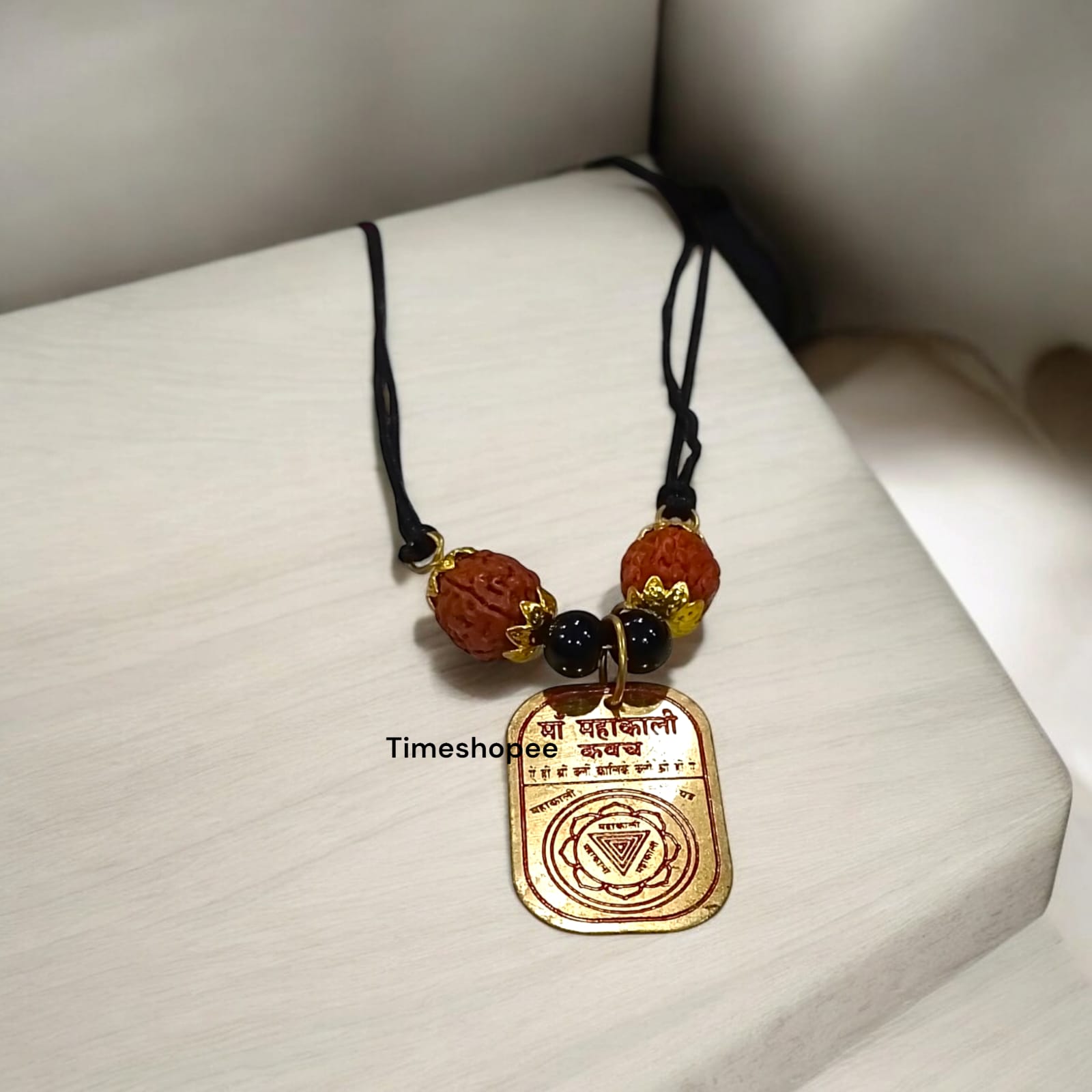 Maa Kali Yantra Locket with 5 Mukhi Rudraksha and Black Agate beads, designed for protection from evil, by Timeshopee