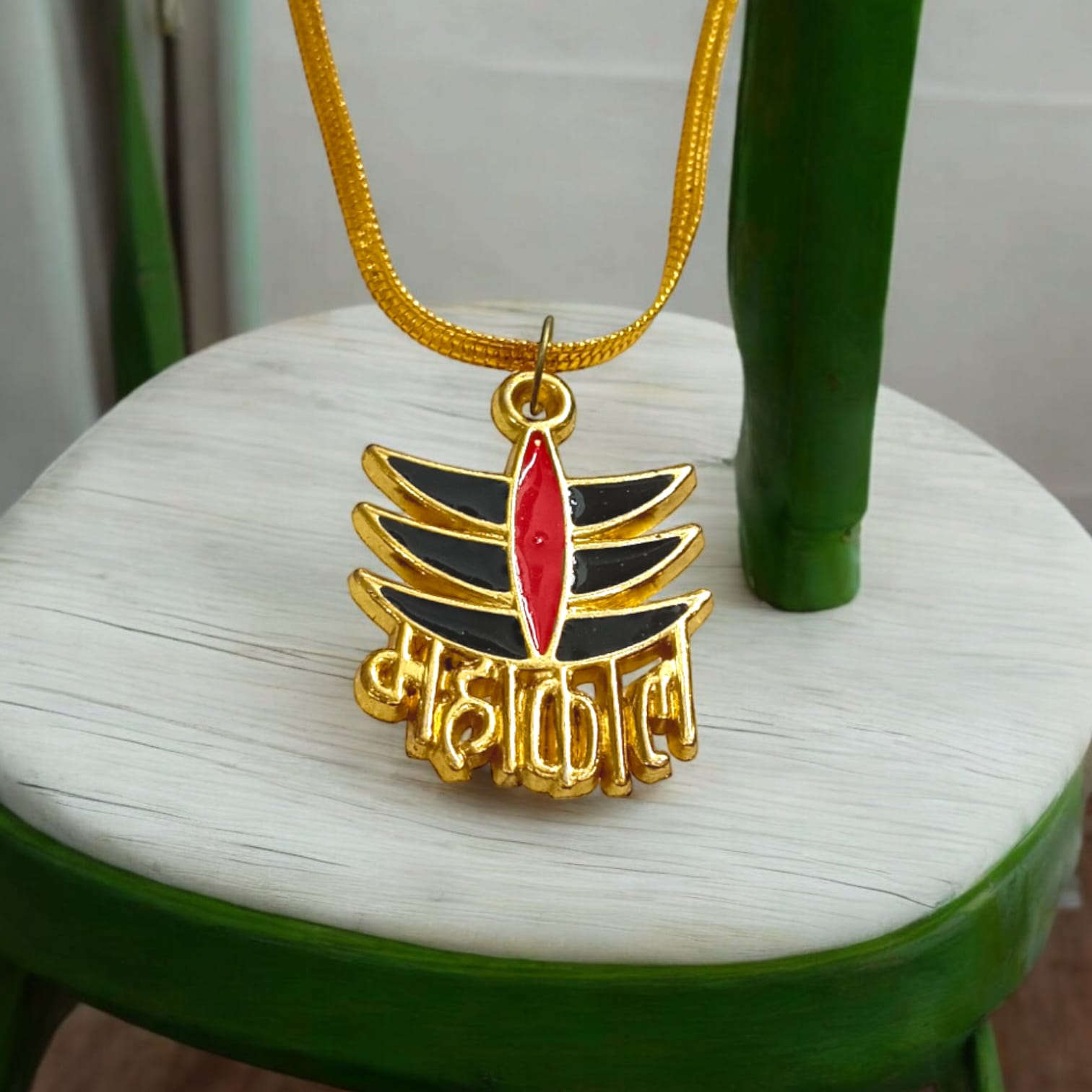 Mahakaal locket with Tripund symbol and golden chain, available at Timeshopee.