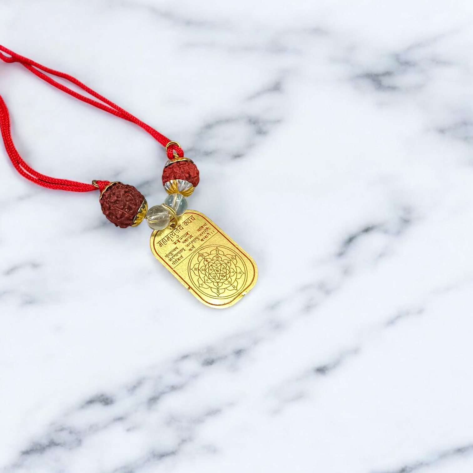 Mahamritunjay Kawach protection locket with divine Mahamritunjay mantra, available at Timeshopee