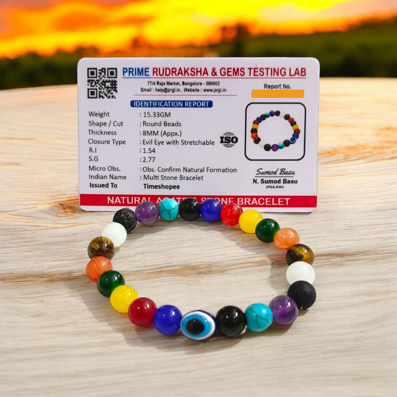 Mix Agate and 7 Chakra bracelet featuring colorful 8MM beads, including Agates, Lava, Amethyst, Tiger Eye, Turquoise, Hessonite, and an Evil Eye bead, offering balance and protection.