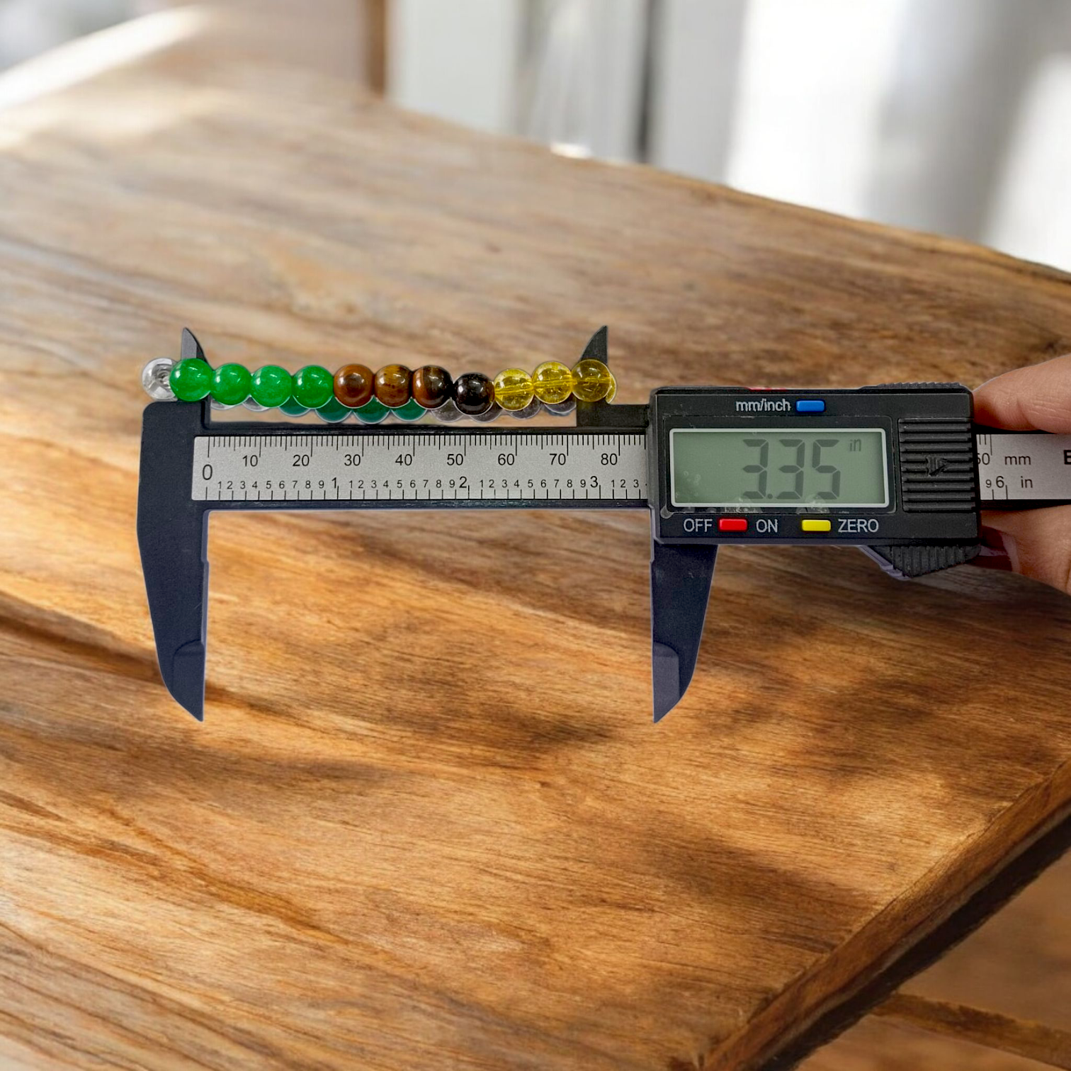 Money Magnet Bracelet with 8mm lab-certified magnetic beads and stretchable design, ideal for attracting wealth, opportunities, and financial growth