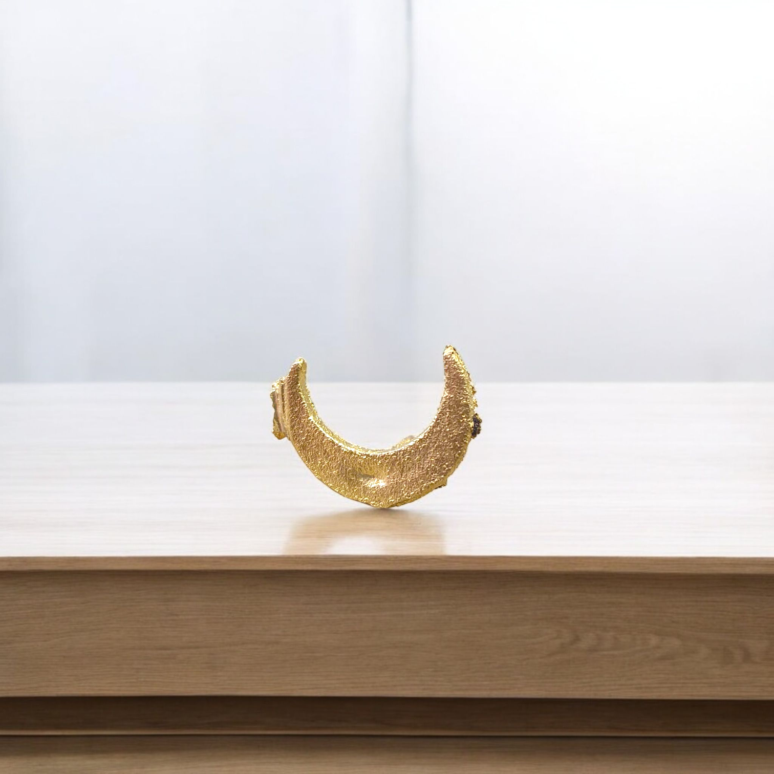 Moon-shaped Chand Tilak stamp tool used for Hindu rituals and daily prayers