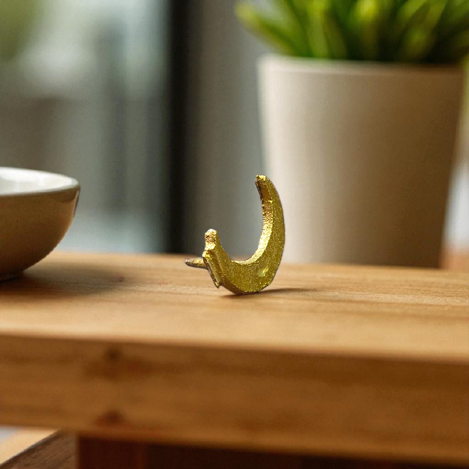 Moon-shaped Chand Tilak stamp tool used for Hindu rituals and daily prayers