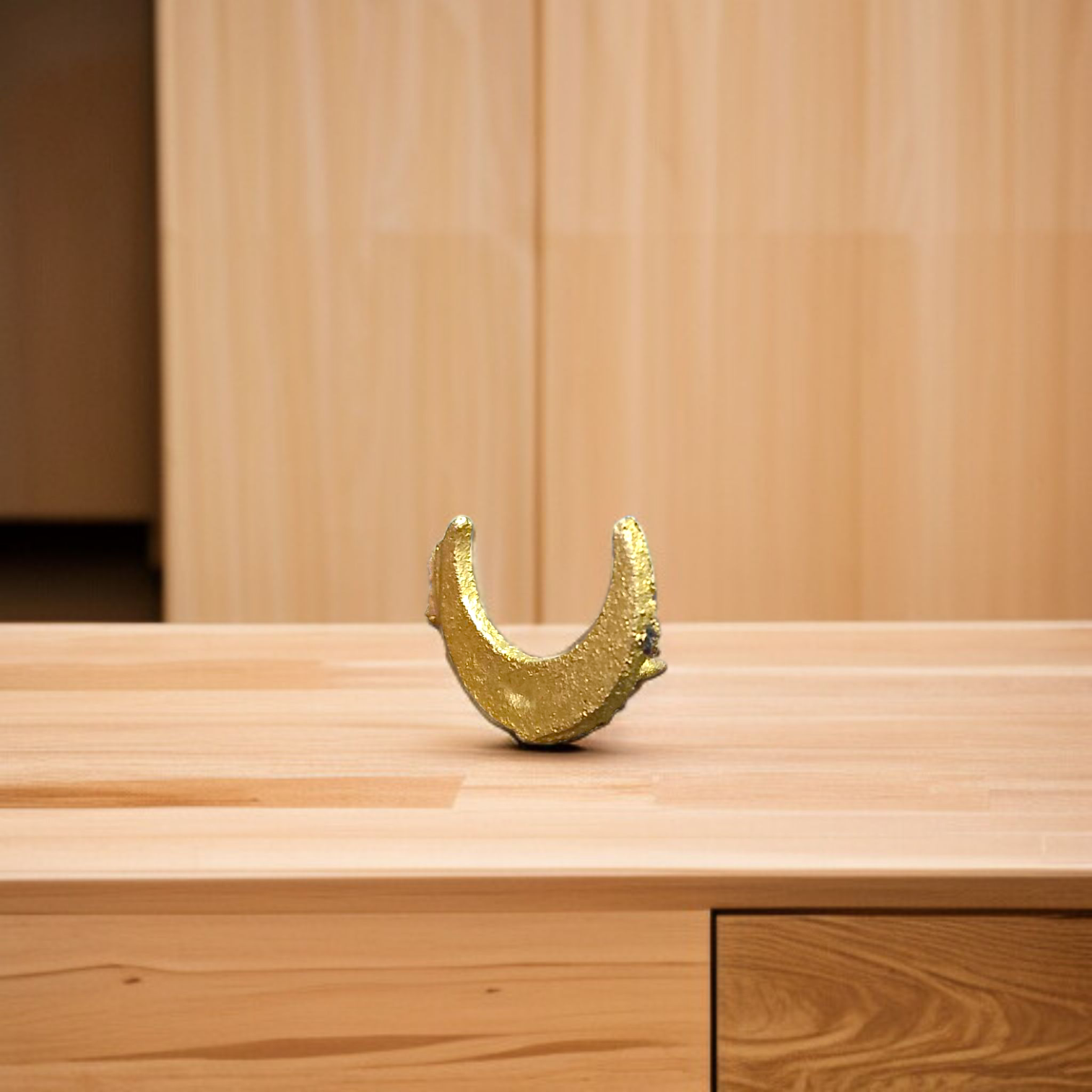 Moon-shaped Chand Tilak stamp tool used for Hindu rituals and daily prayers