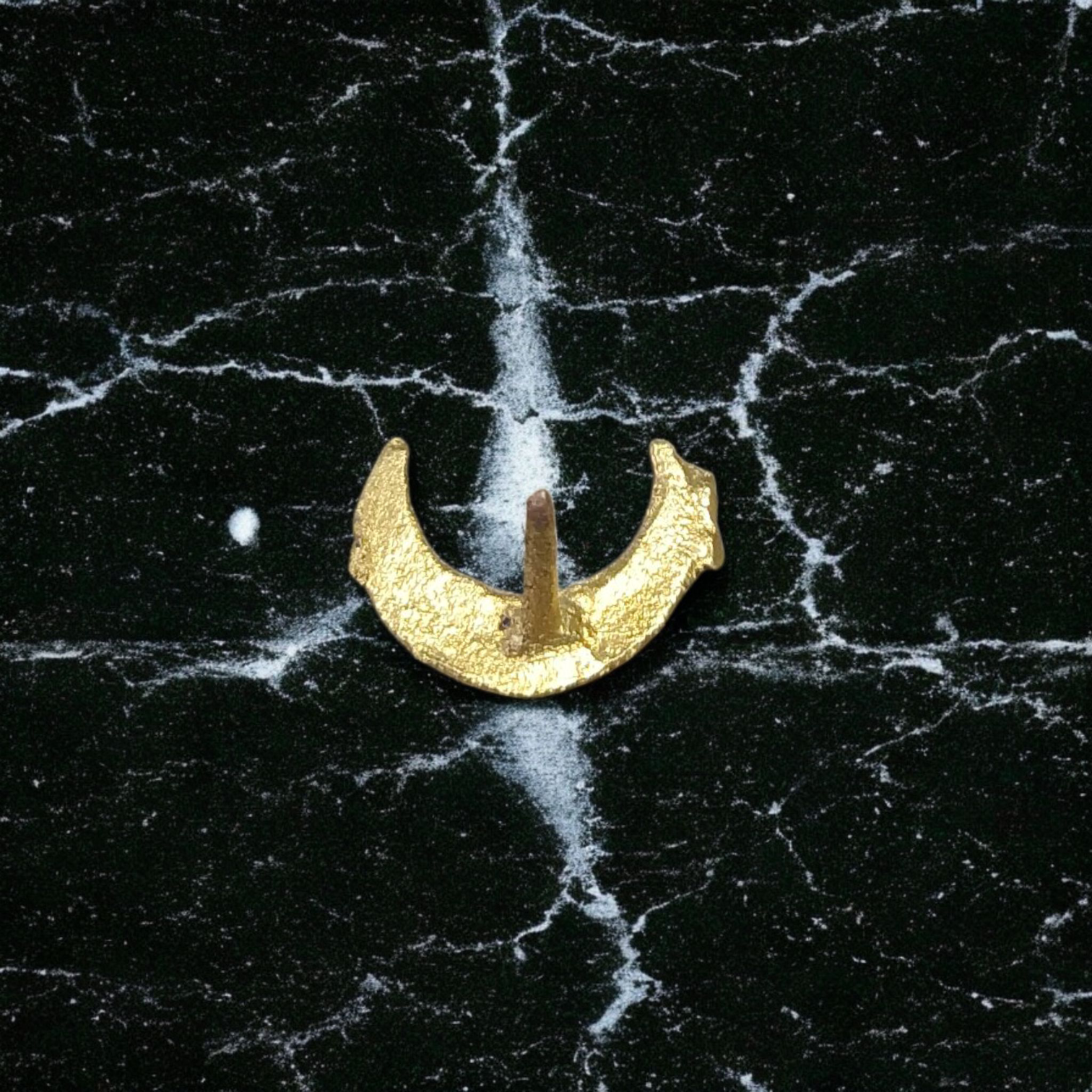 Moon-shaped Chand Tilak stamp tool used for Hindu rituals and daily prayers