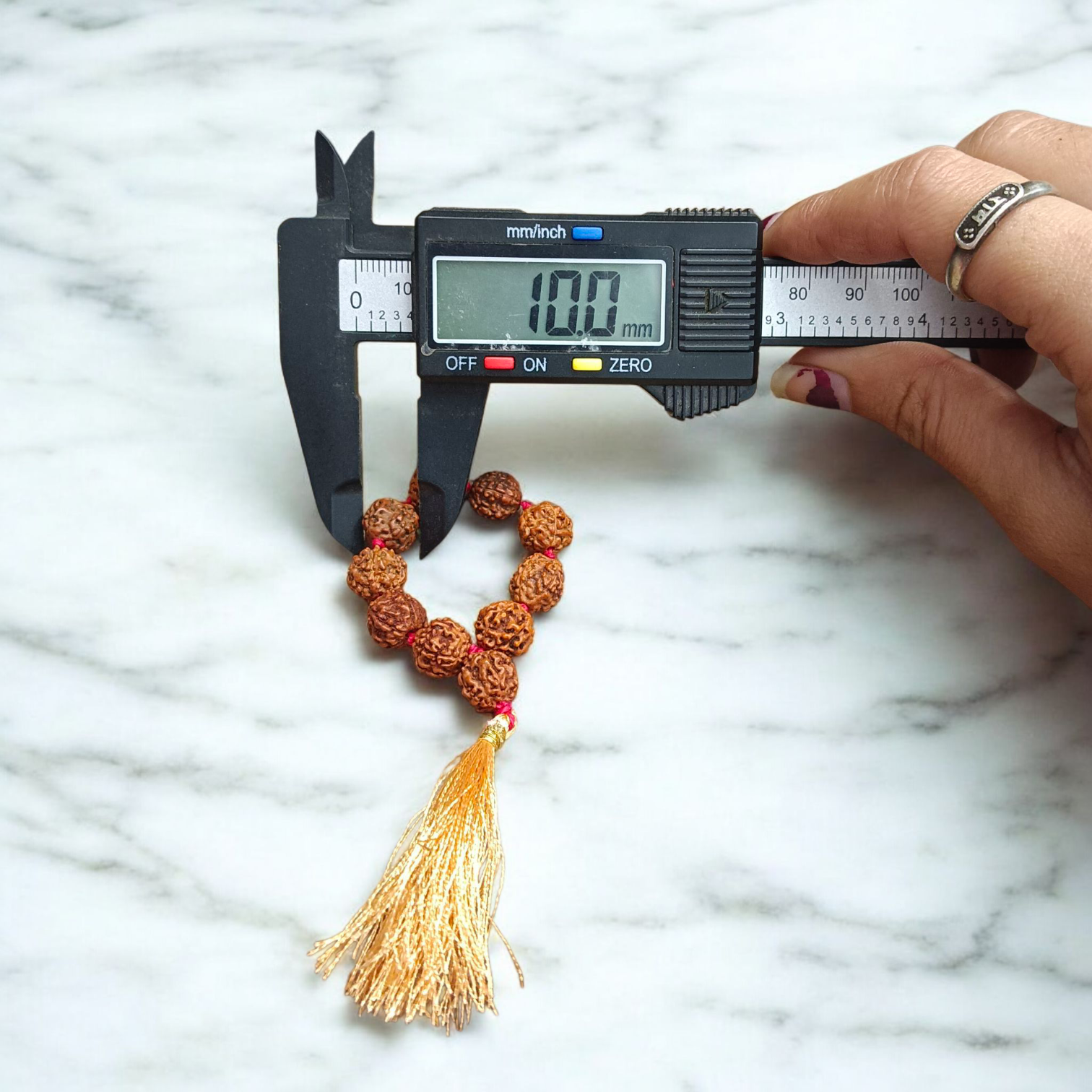 Natural 5 Mukhi Rudraksha Finger Mala with 9+1 round brown beads (8mm), used for meditation, chanting, and healing practices