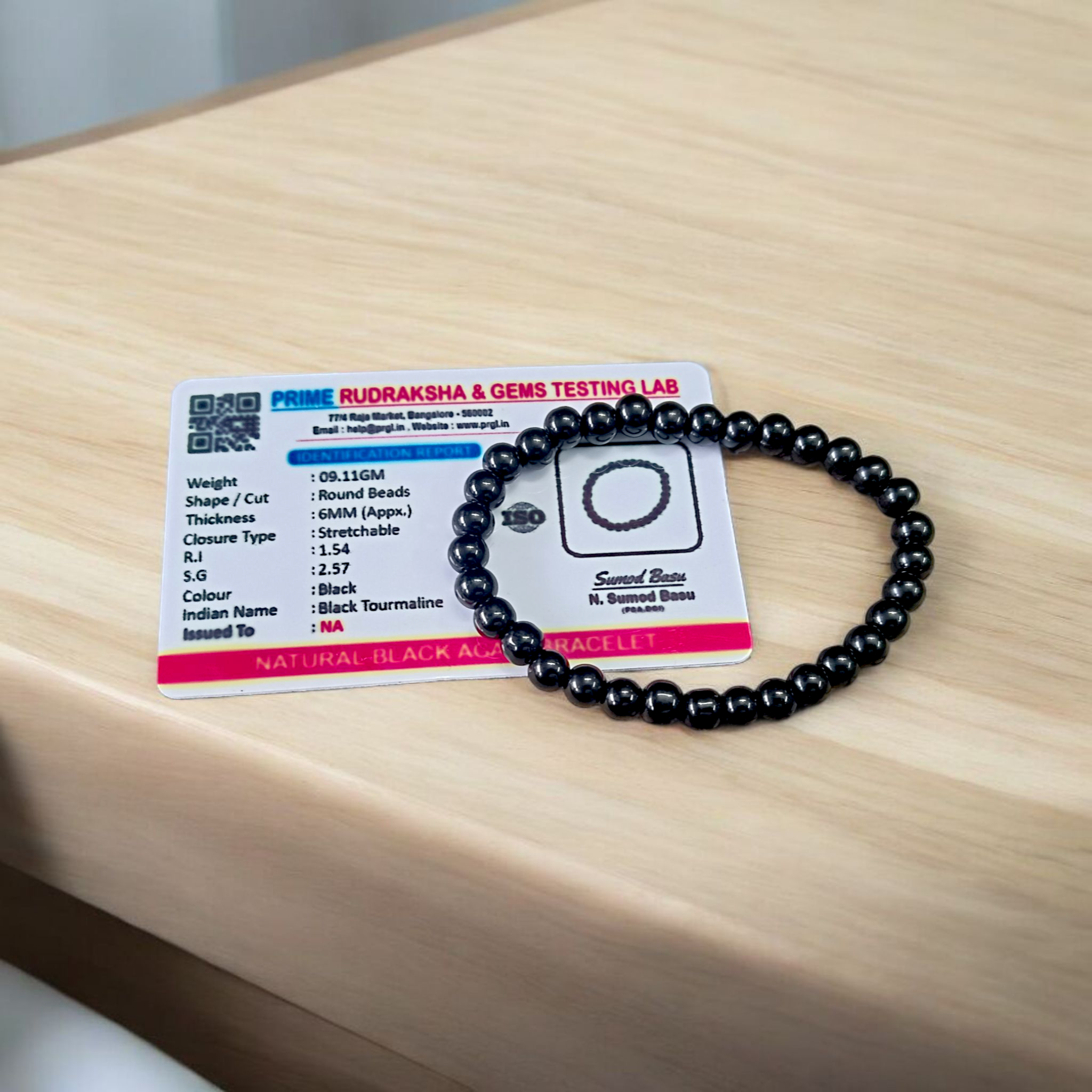 Natural Black Agate Bracelet with 6mm beads, stretchable, displayed on a neutral background