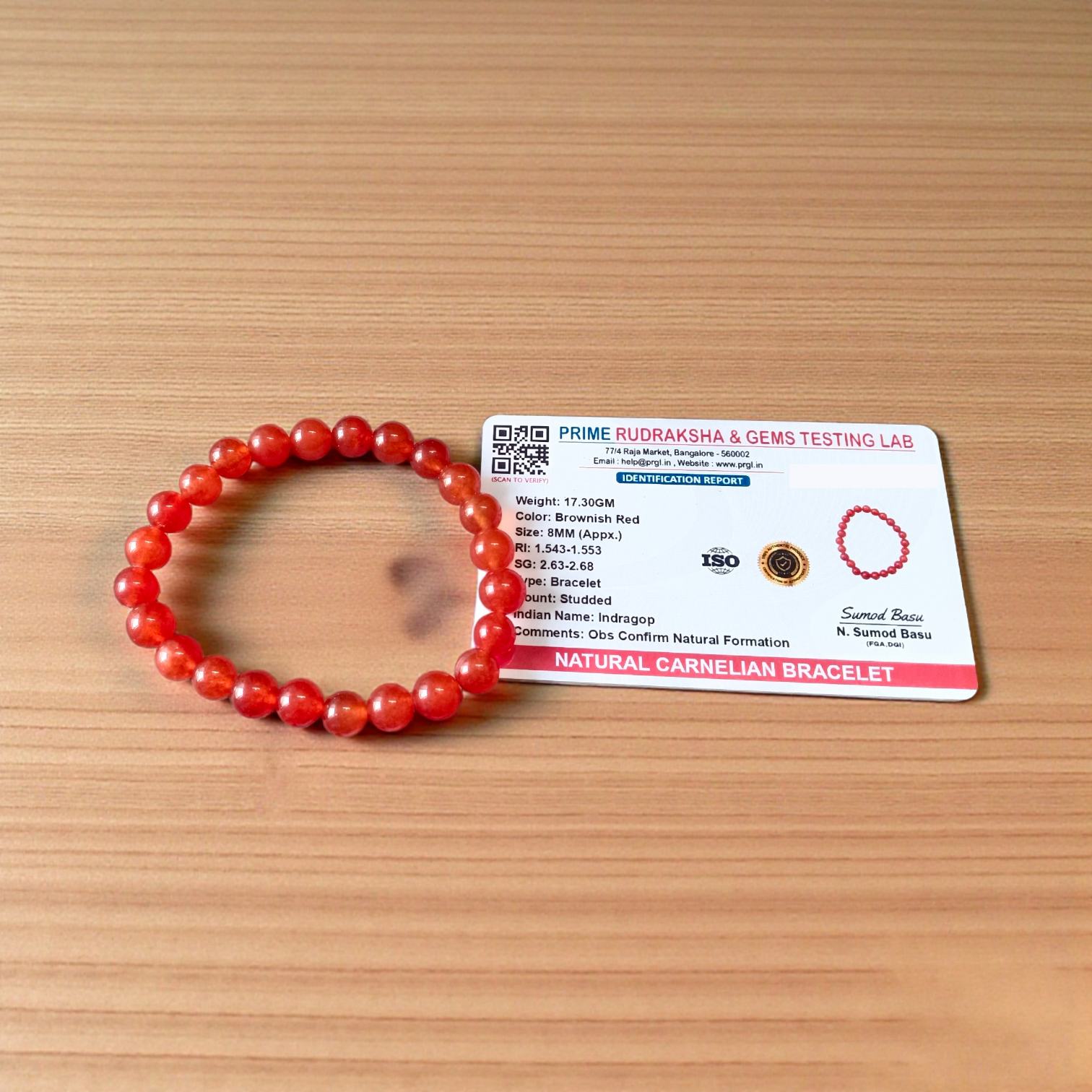 Natural Carnelian Bracelet with 8mm round beads, stretchable design, displayed neatly for wellness and fashion use