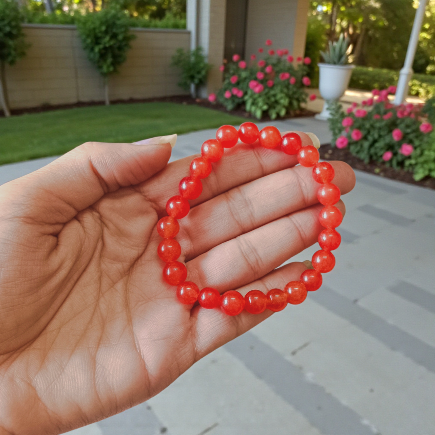 Natural Carnelian Bracelet with 8mm round beads, stretchable design, displayed neatly for wellness and fashion use