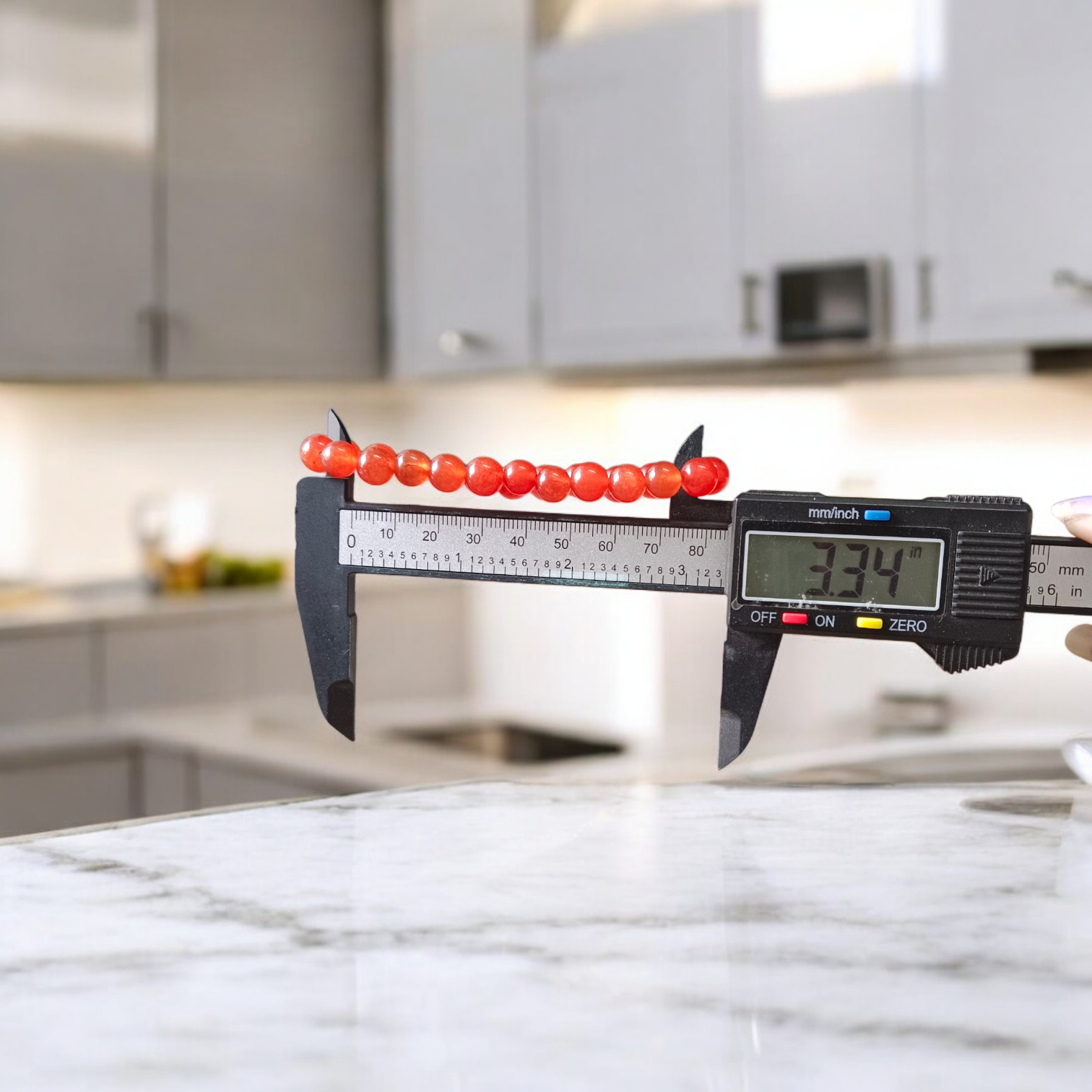 Natural Carnelian Bracelet with 8mm round beads, stretchable design, displayed neatly for wellness and fashion use