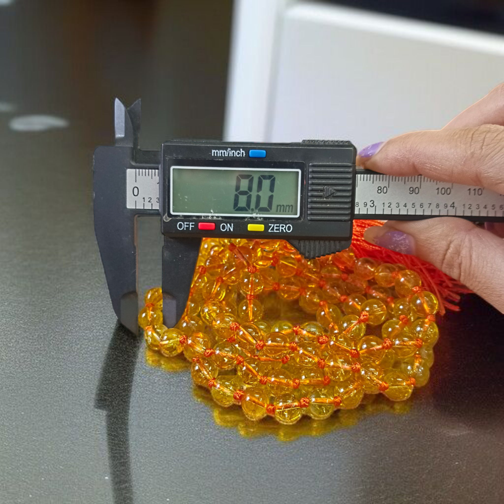 Natural Citrine Mala with 108+1 crystal beads used for meditation, energy healing, and daily spiritual wear