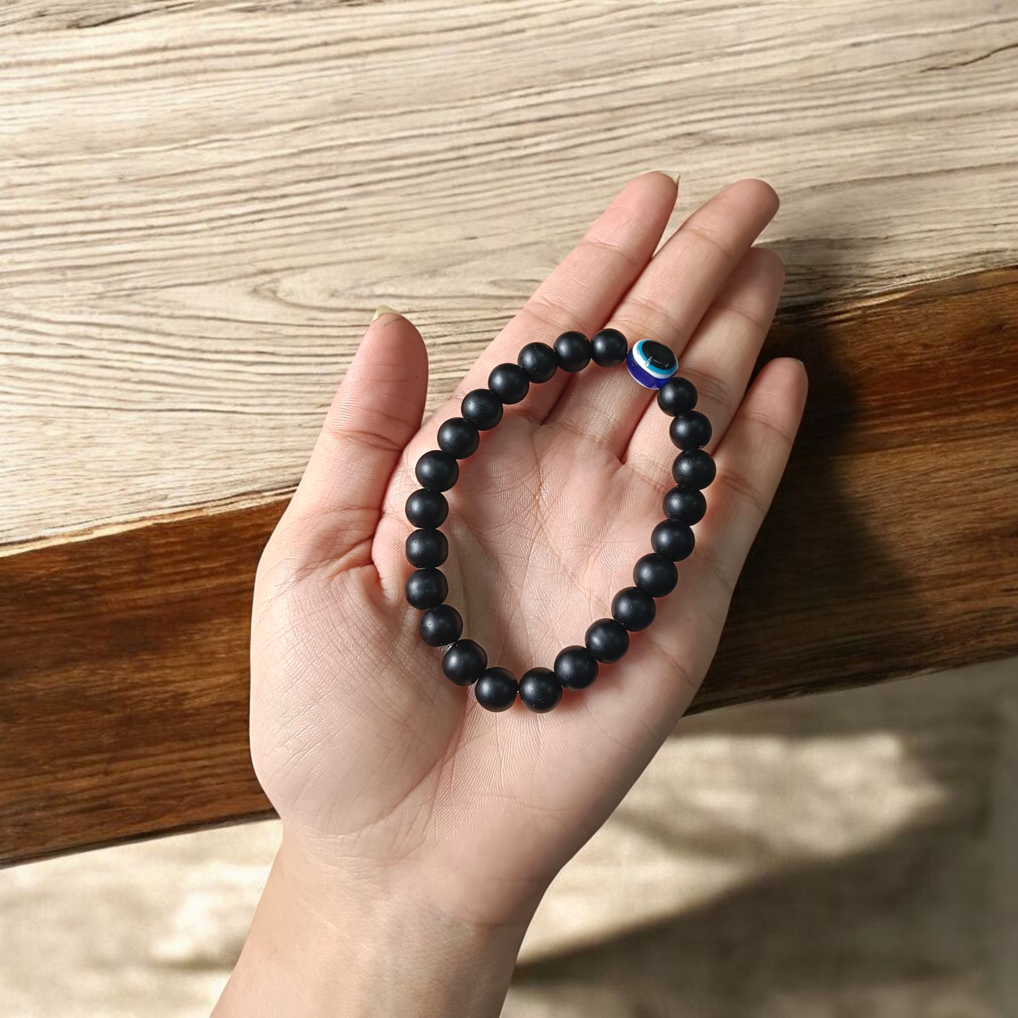 Natural Karungali (Ebony) Bracelet with Evil Eye Bead, stretchable 8mm beads, lab-certified and spiritually protective – Timeshopee product image