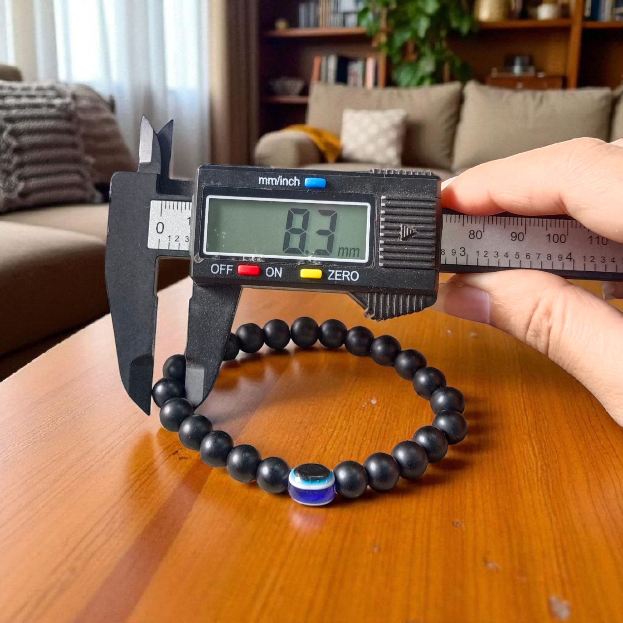 Natural Karungali (Ebony) Bracelet with Evil Eye Bead, stretchable 8mm beads, lab-certified and spiritually protective – Timeshopee product image