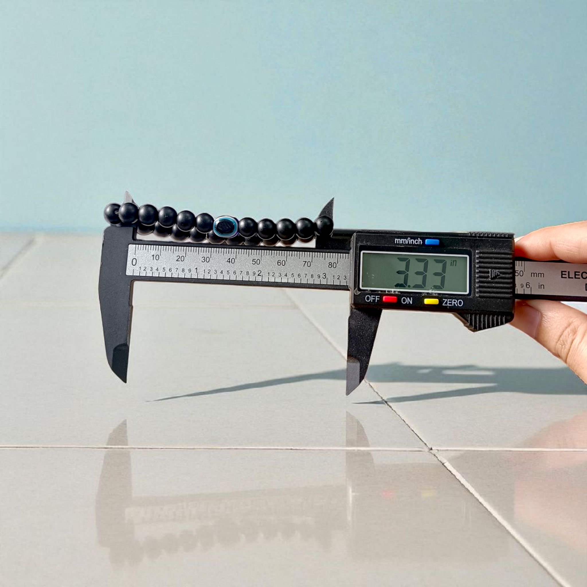 Natural Karungali (Ebony) Bracelet with Evil Eye Bead, stretchable 8mm beads, lab-certified and spiritually protective – Timeshopee product image