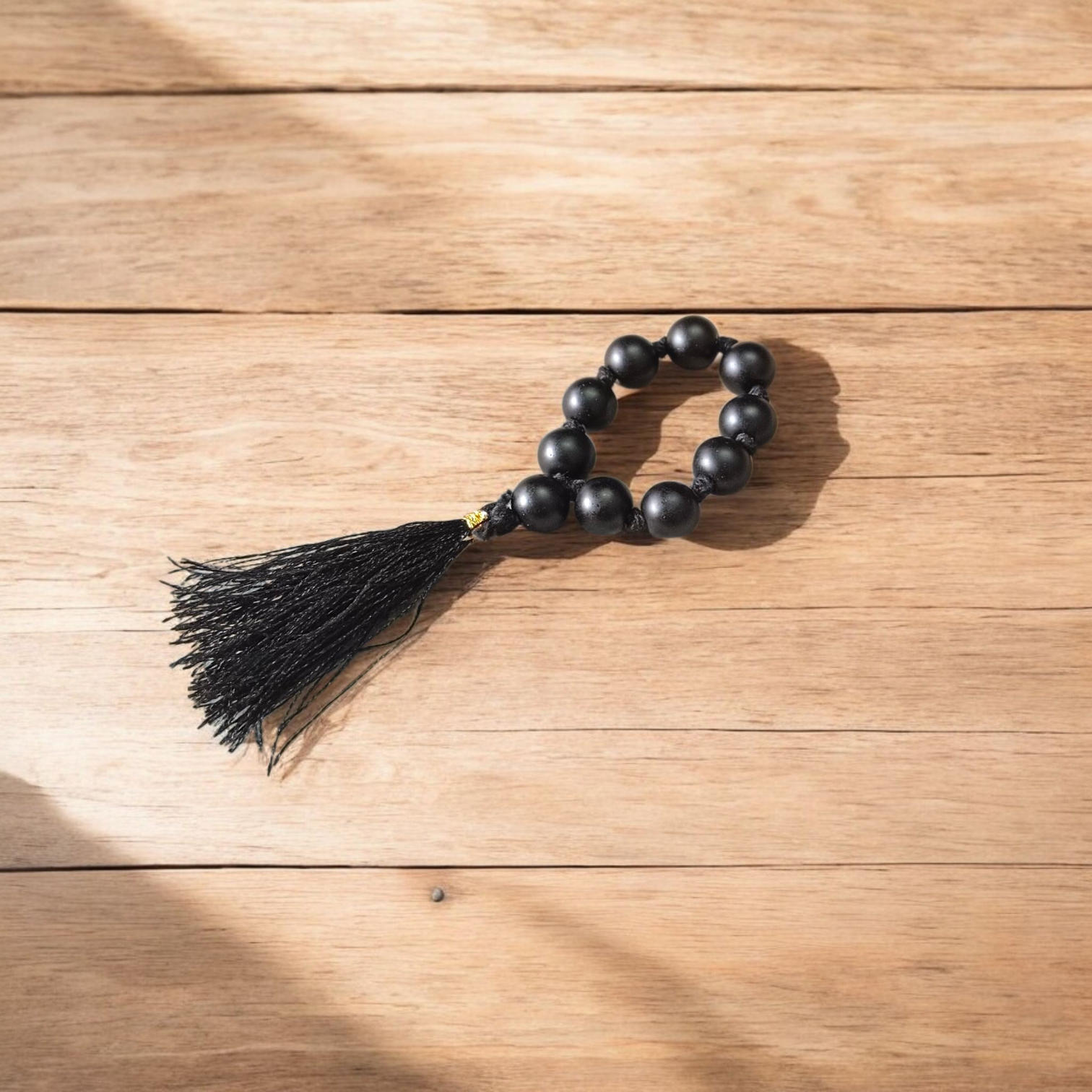 Natural Karungali (Ebony) Finger Mala with 9+1 dark wooden beads, 8mm size, used for meditation, chanting, and puja rituals, suitable for men and women