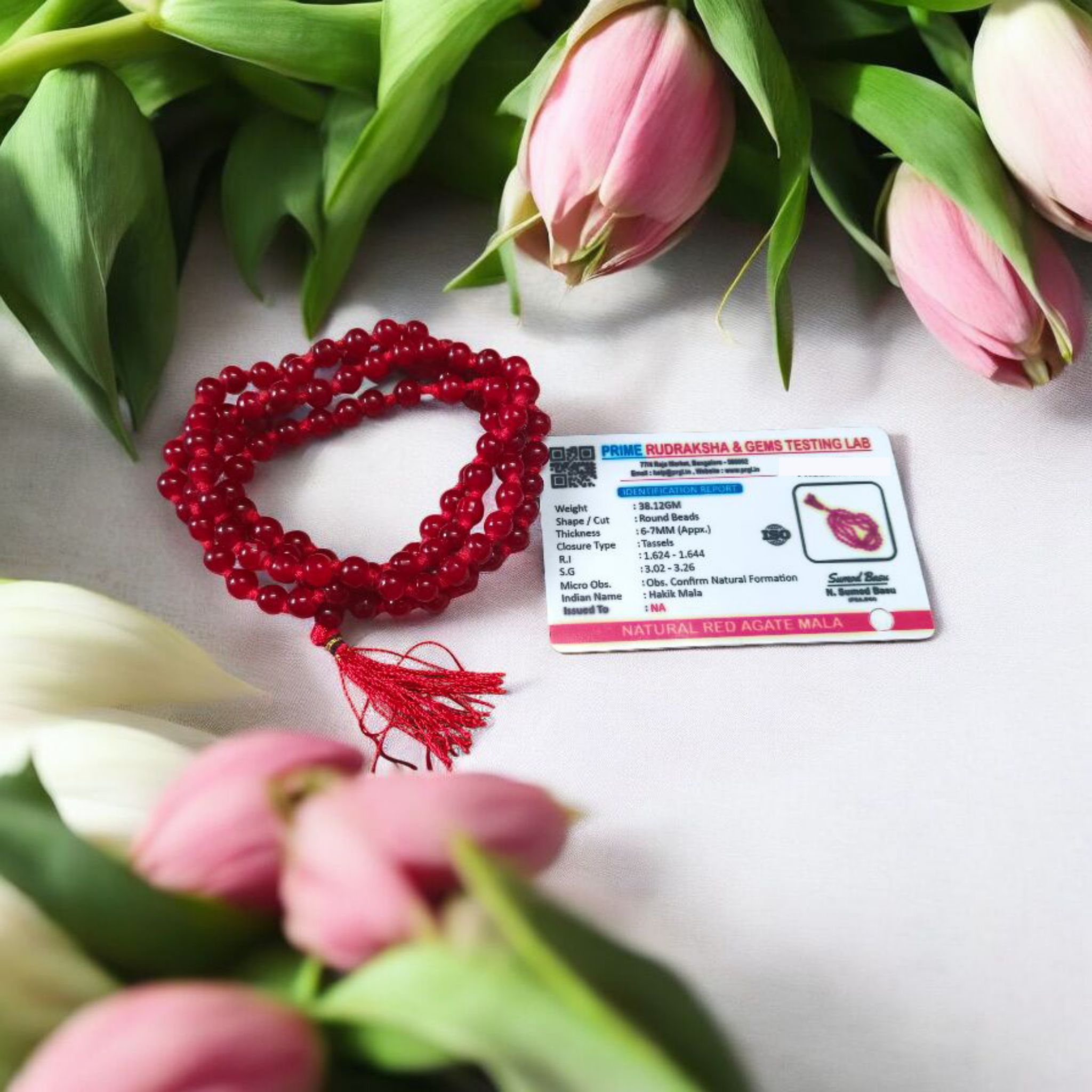 Natural Red Agate Mala with 108+1 round 6mm beads, ideal for mantra chanting and spiritual wear, shown with vibrant red stones and a guru bead