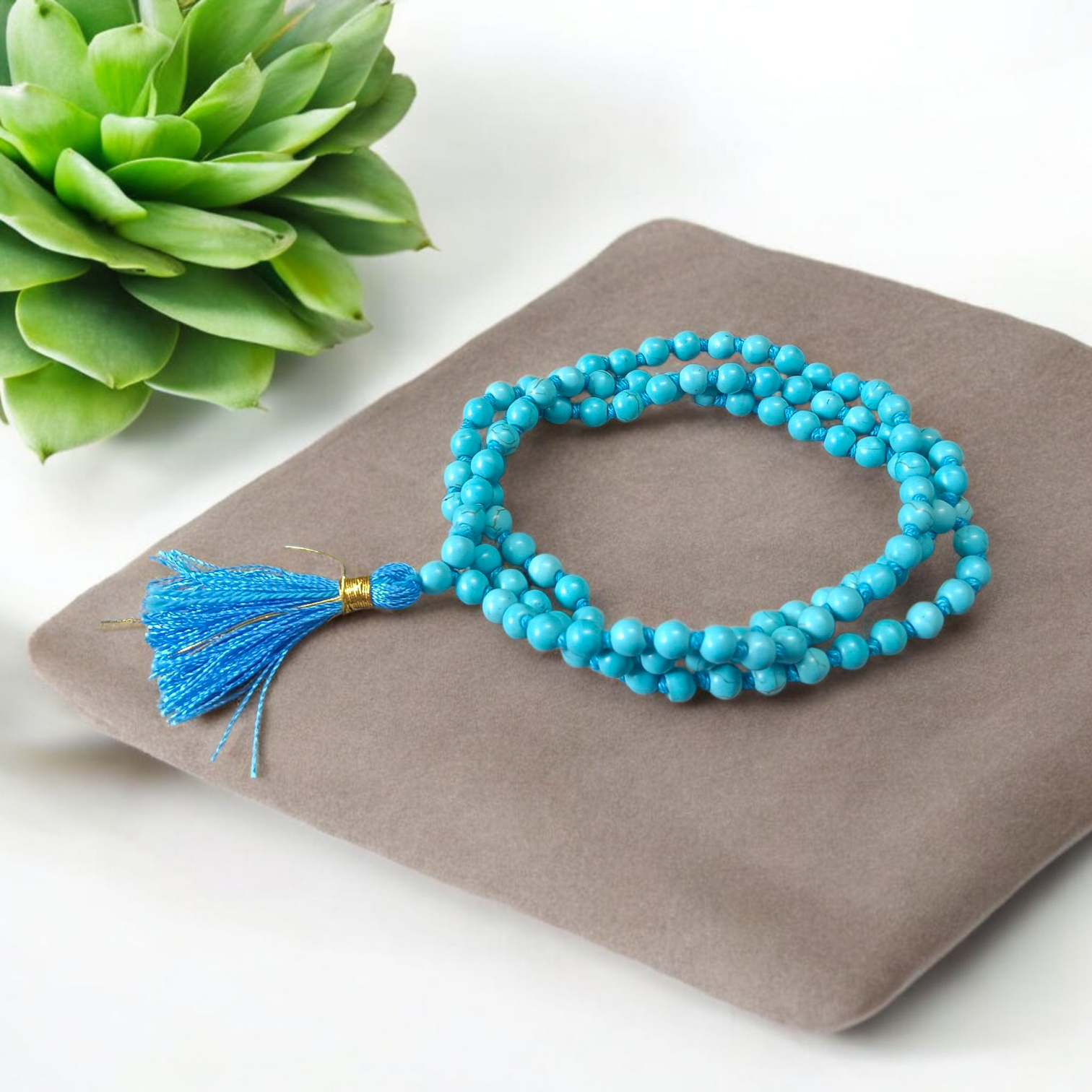 Natural Turquoise (Firoza) Mala with 108+1 round beads (6mm), used for meditation, healing, and spiritual protection