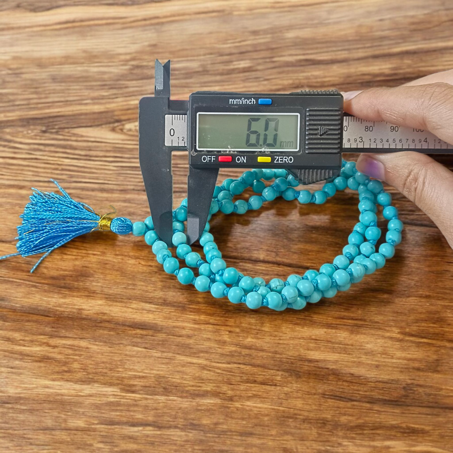 Natural Turquoise (Firoza) Mala with 108+1 round beads (6mm), used for meditation, healing, and spiritual protection