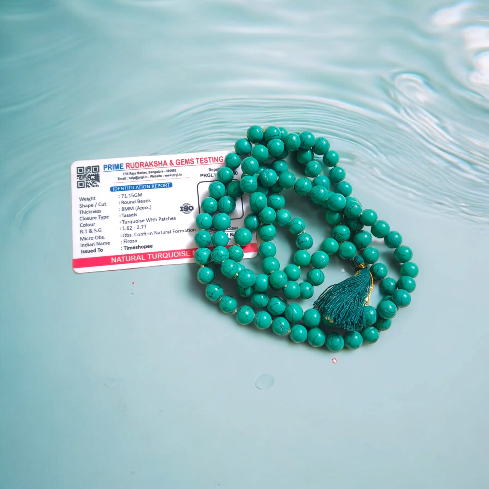 Natural Turquoise Mala with 8mm beads laid out on a wooden surface, showing two variants 27+1 and 108+1 beads.