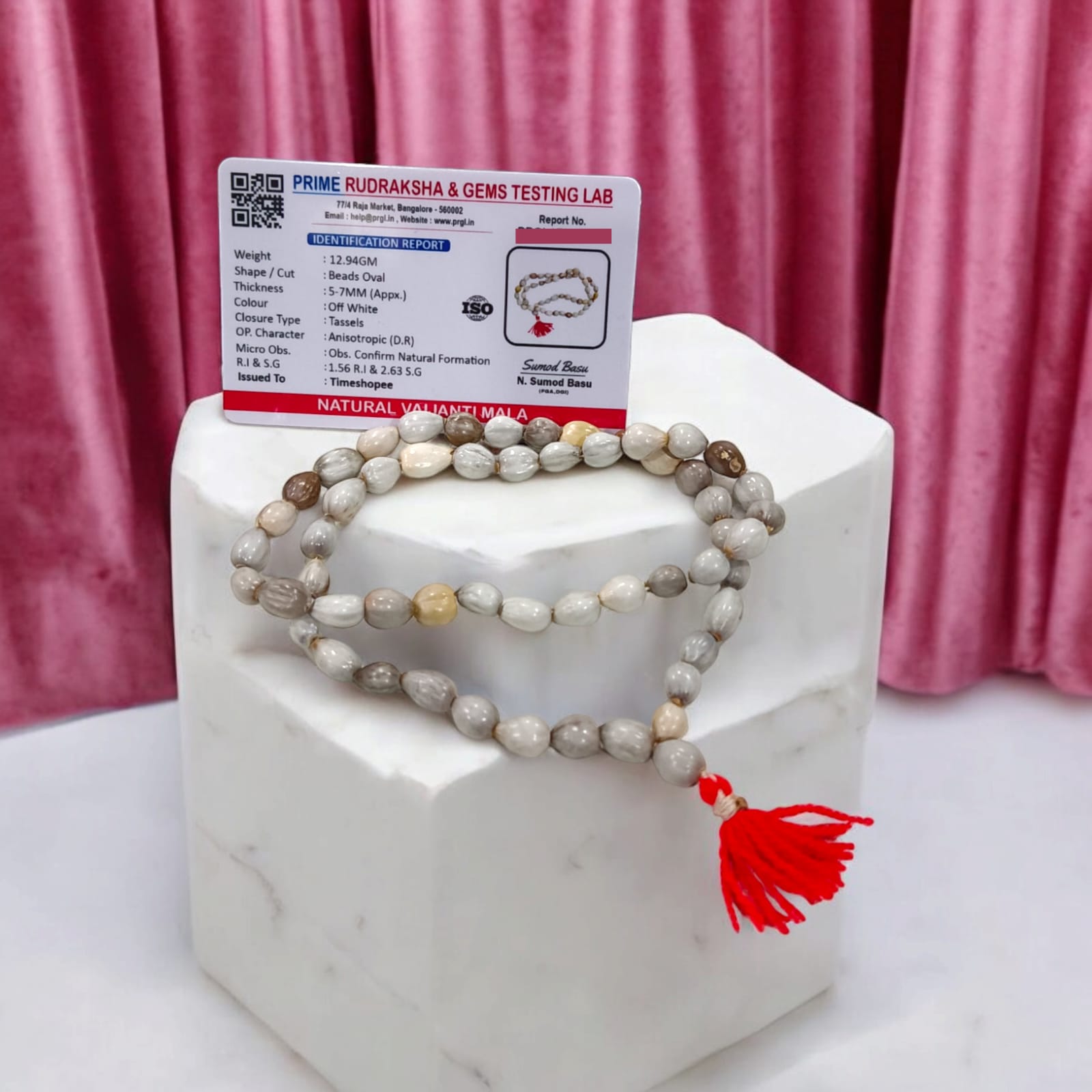 Natural Vaijanti Mala with Lab Certificate, featuring 54+1 beads, displayed inside a protective pouch from Timeshopee.