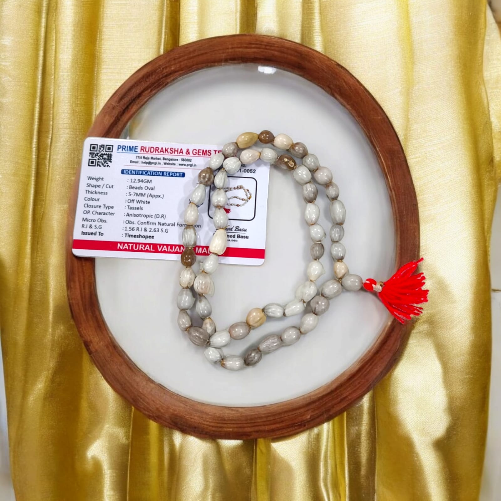 Natural Vaijanti Mala with Lab Certificate, featuring 54+1 beads, displayed inside a protective pouch from Timeshopee.