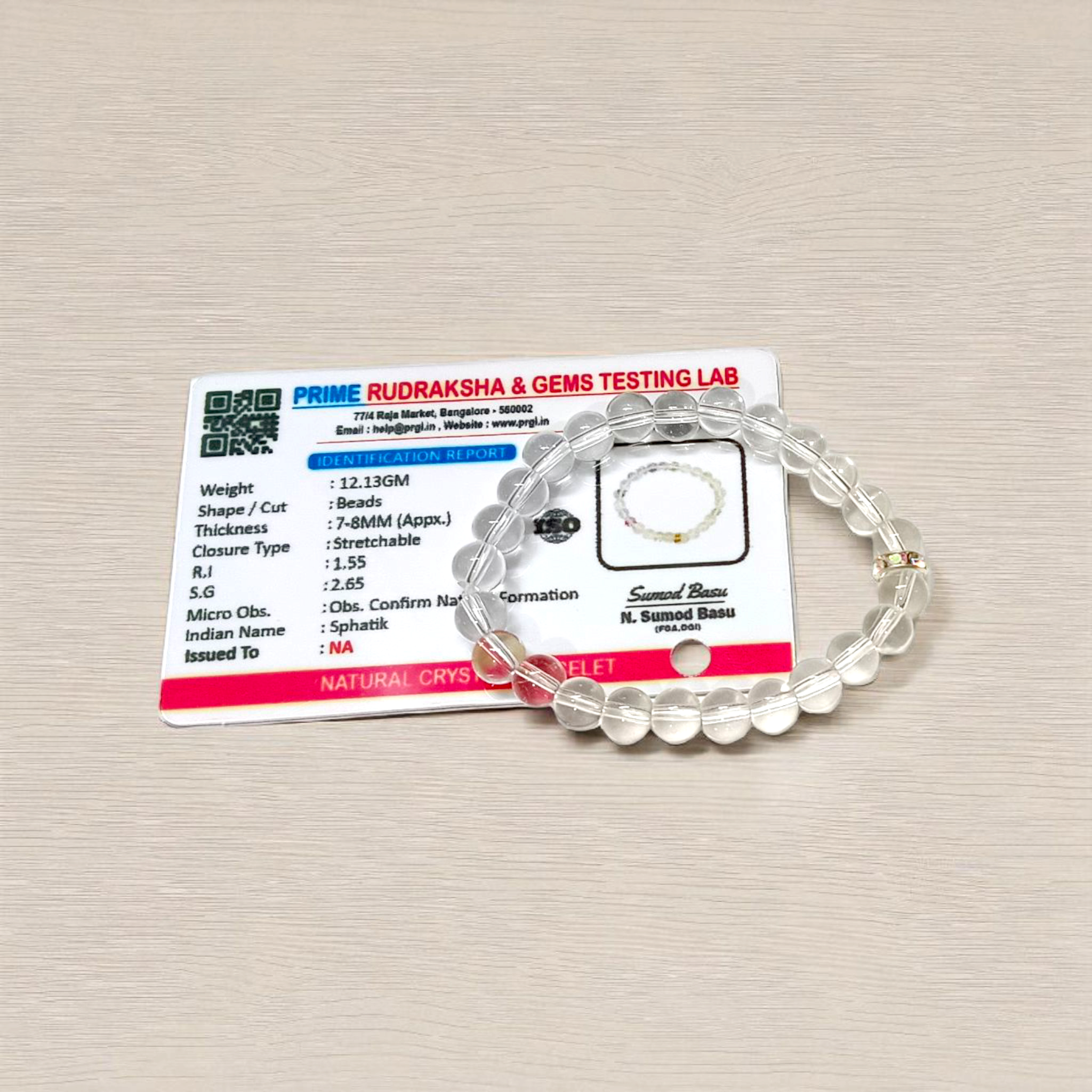 Natural crystal bracelet made of 7mm beads with stretchable string, unisex design, displayed on a neutral background