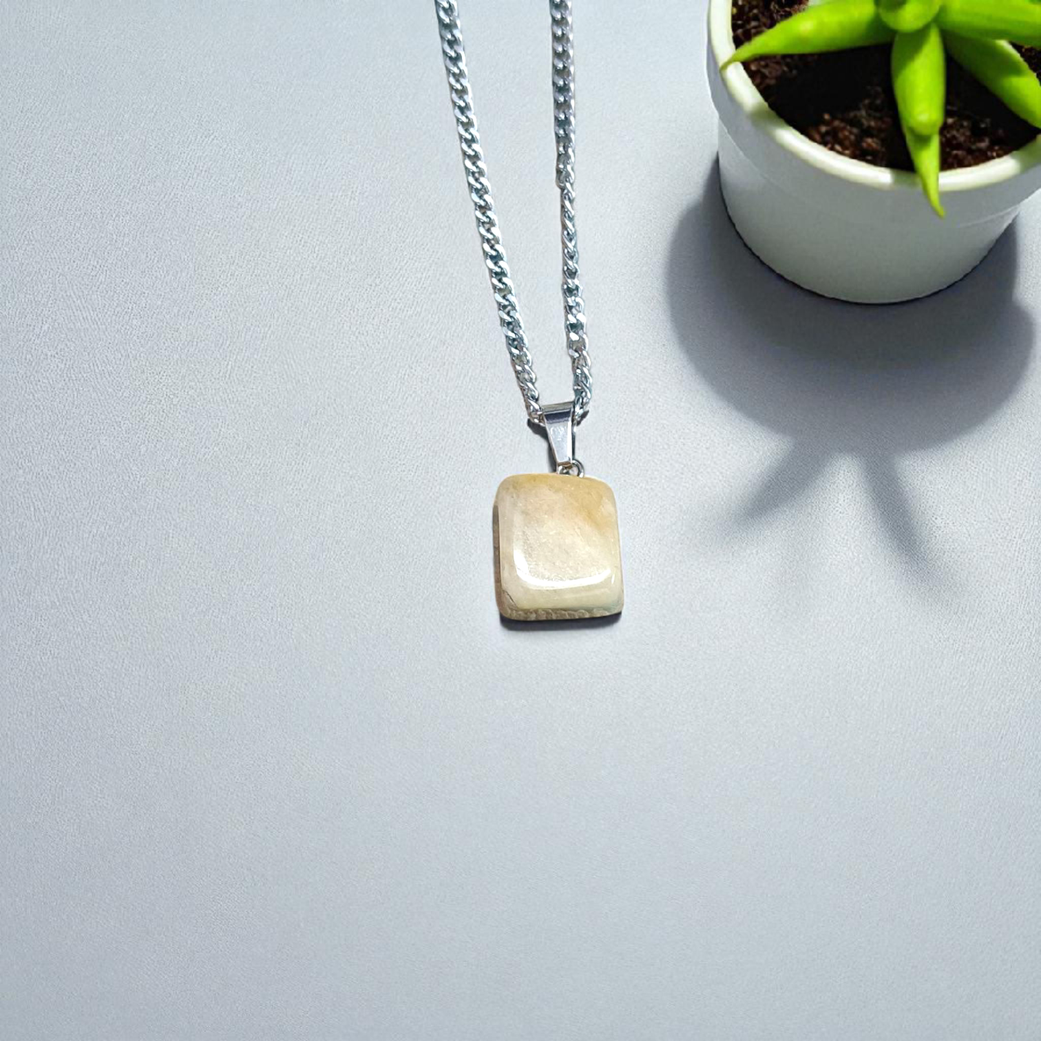 Original Yellow Aventurine Stone Pendant with lab certification – spiritual pendant ideal for men and women, shown with close-up of natural polished stone in hook pendant form