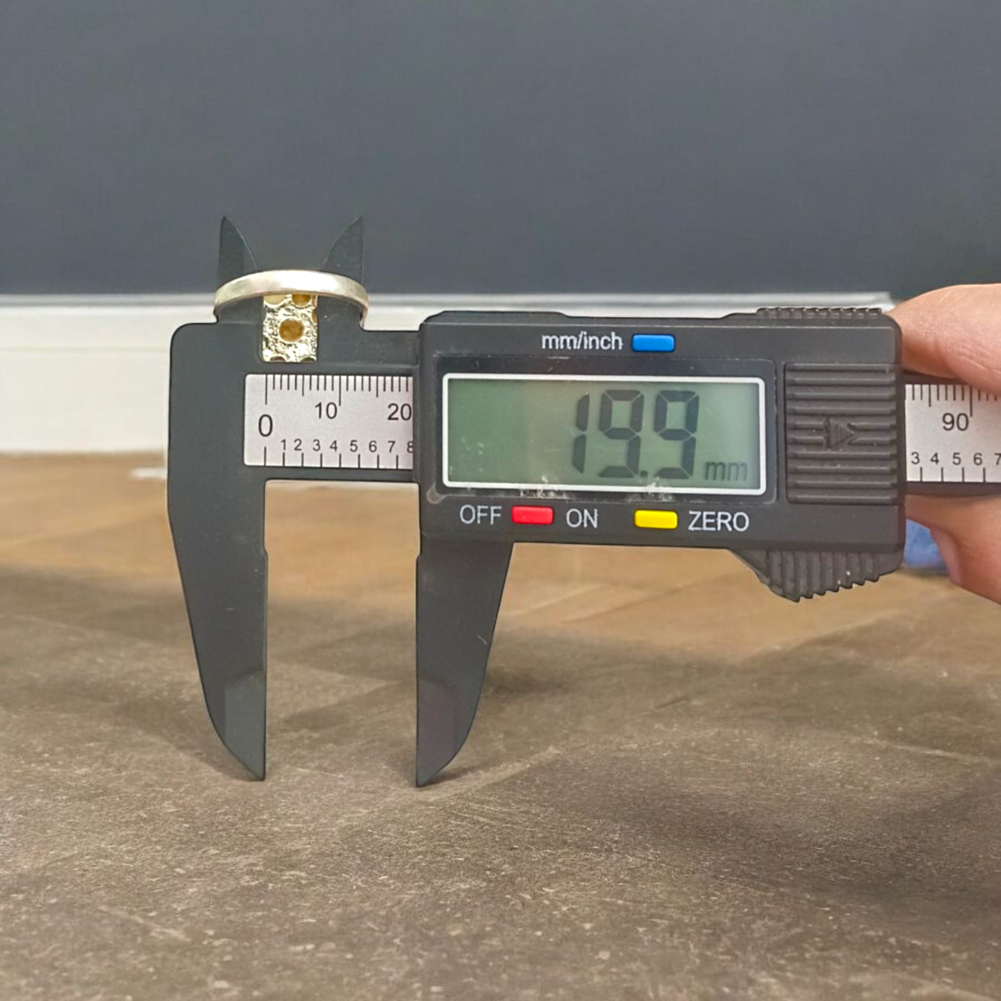 Oval-shaped Navratan Ring with silver plating, featuring nine gemstones for astrological balance and spiritual