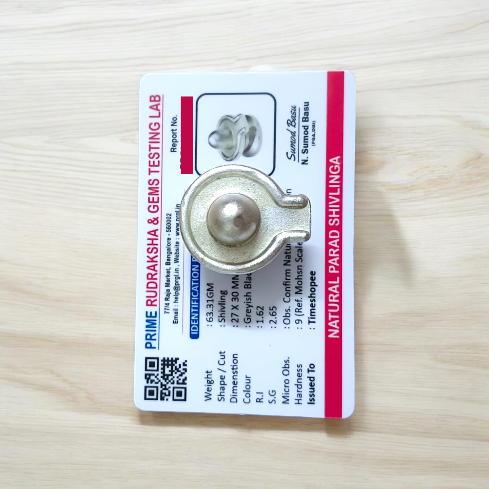 Parad Shivling - Parad Lingam, 63gm Lab Certified, from Timeshopee. A sacred mercury Shivling weighing 63gm, representing the energy of Lord Shiva for spiritual growth, protection, and peace