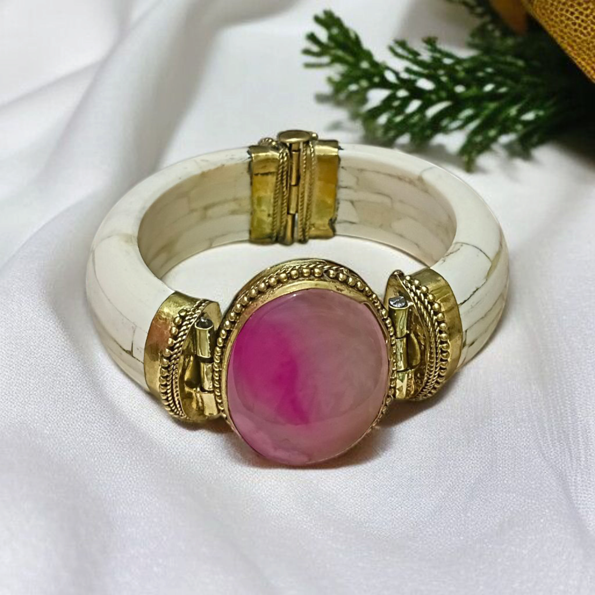 Pink Agate Bracelet with natural, lab-certified pink hakik stones, handcrafted in an antique finish, placed on a soft, feminine background
