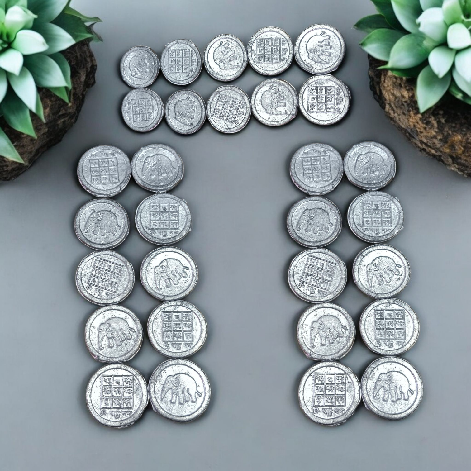 Ranga Rahu Yantra Coin featuring intricate designs, used for remedies against Rahu’s malefic effects, suitable for carrying or placement in home or office