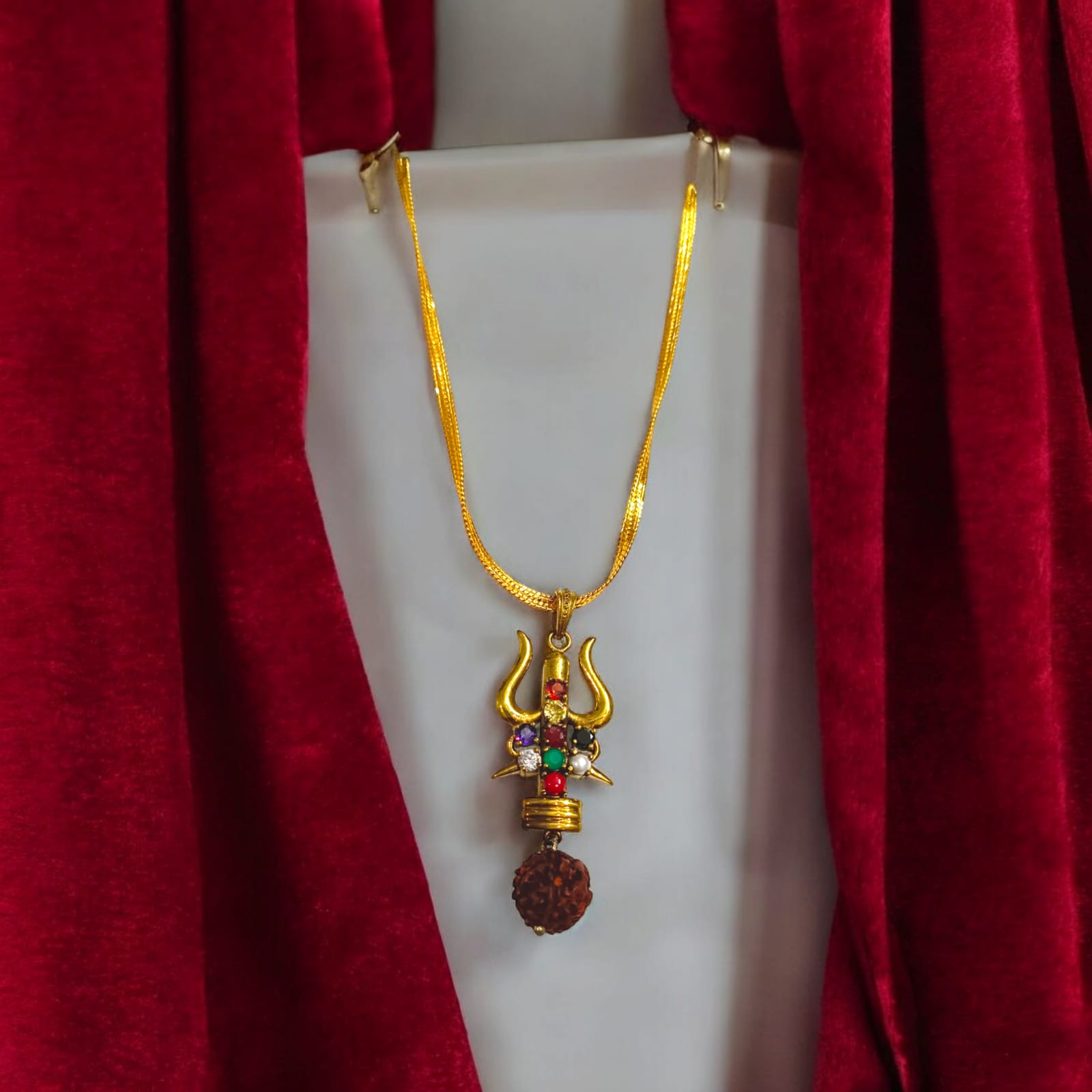 Rudraksha Trishul Locket with Gold-Finished Chain and Navratna Gemstones by Timeshopee
