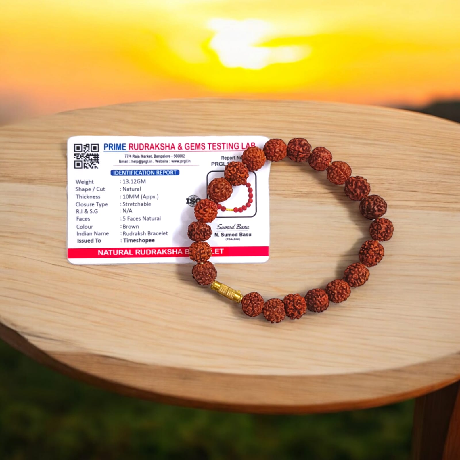 Rudraksha bracelet featuring 10MM beads, lab certified, displayed on a neutral background, highlighting its intricate design and quality certification.
