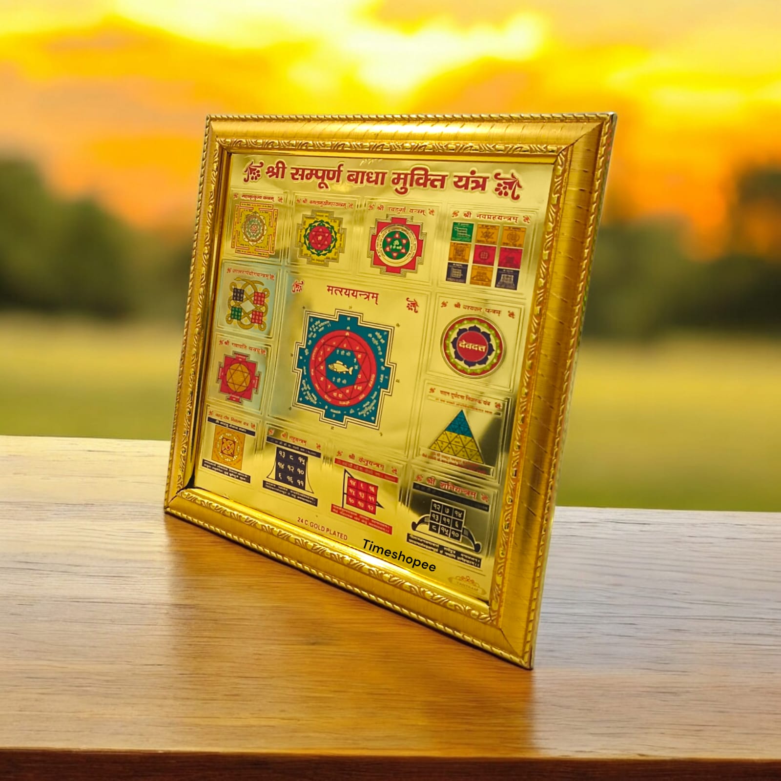Sampoorna Badha Mukti Yantra, 24K gold-plated with wooden frame, featuring multiple powerful Yantras for holistic protection and prosperity.