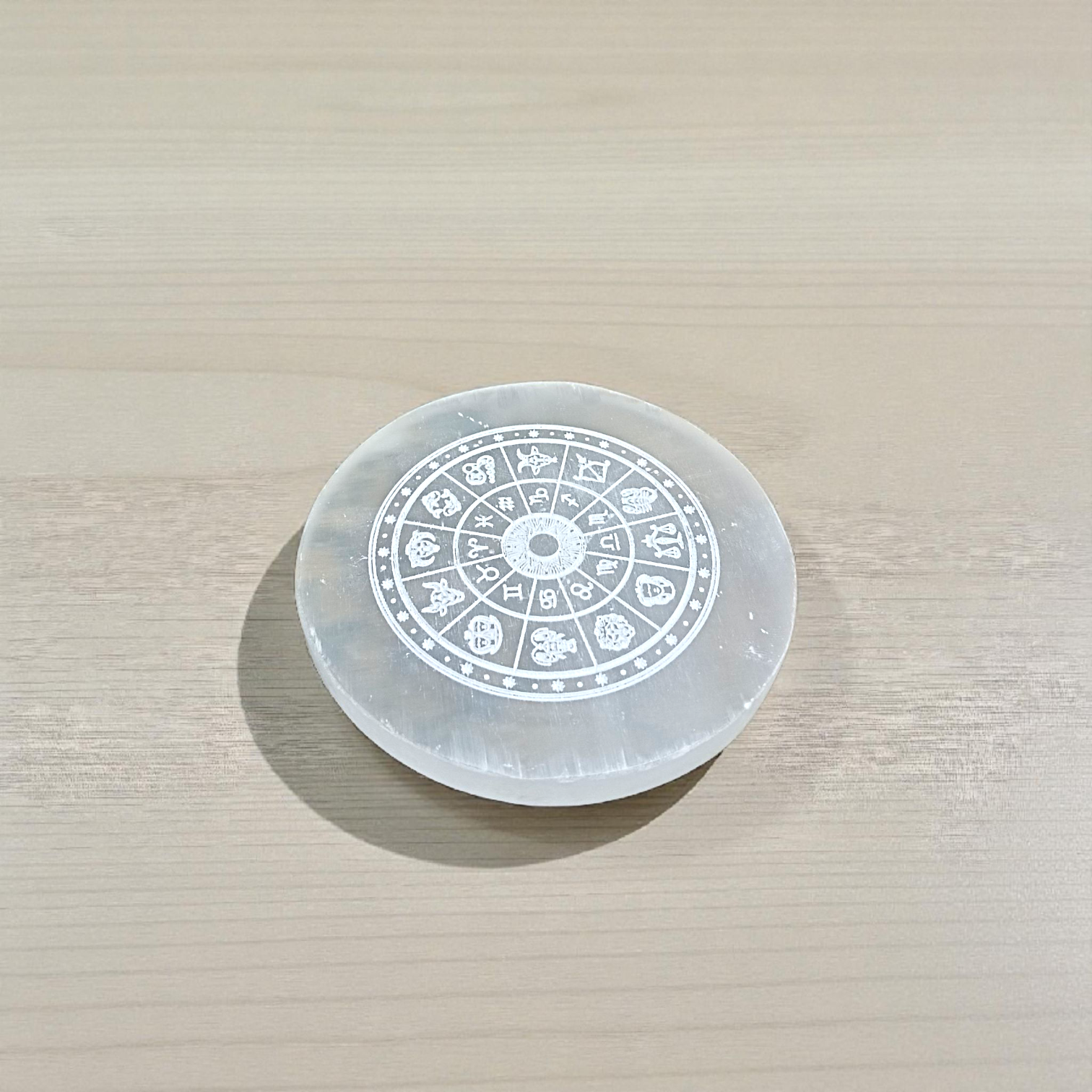 Selenite Crystal Charging Plate with engraved Zodiac signs used for crystal cleansing and healing rituals