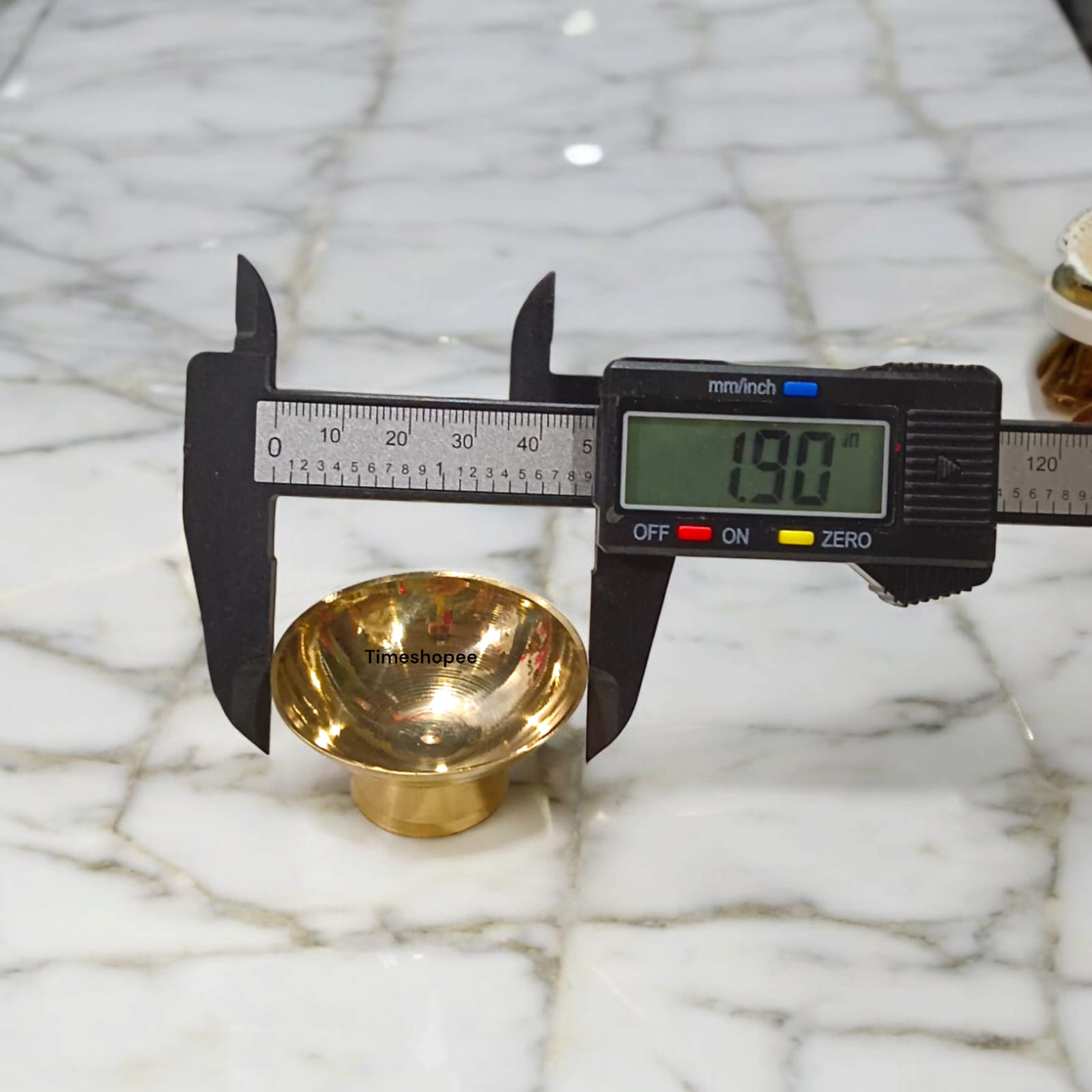 Set_of_2_brass_bowls_for_Chandan_and_Kum_Kum_perfect_for_devotional_rituals_and_elegant_altar_decoration.