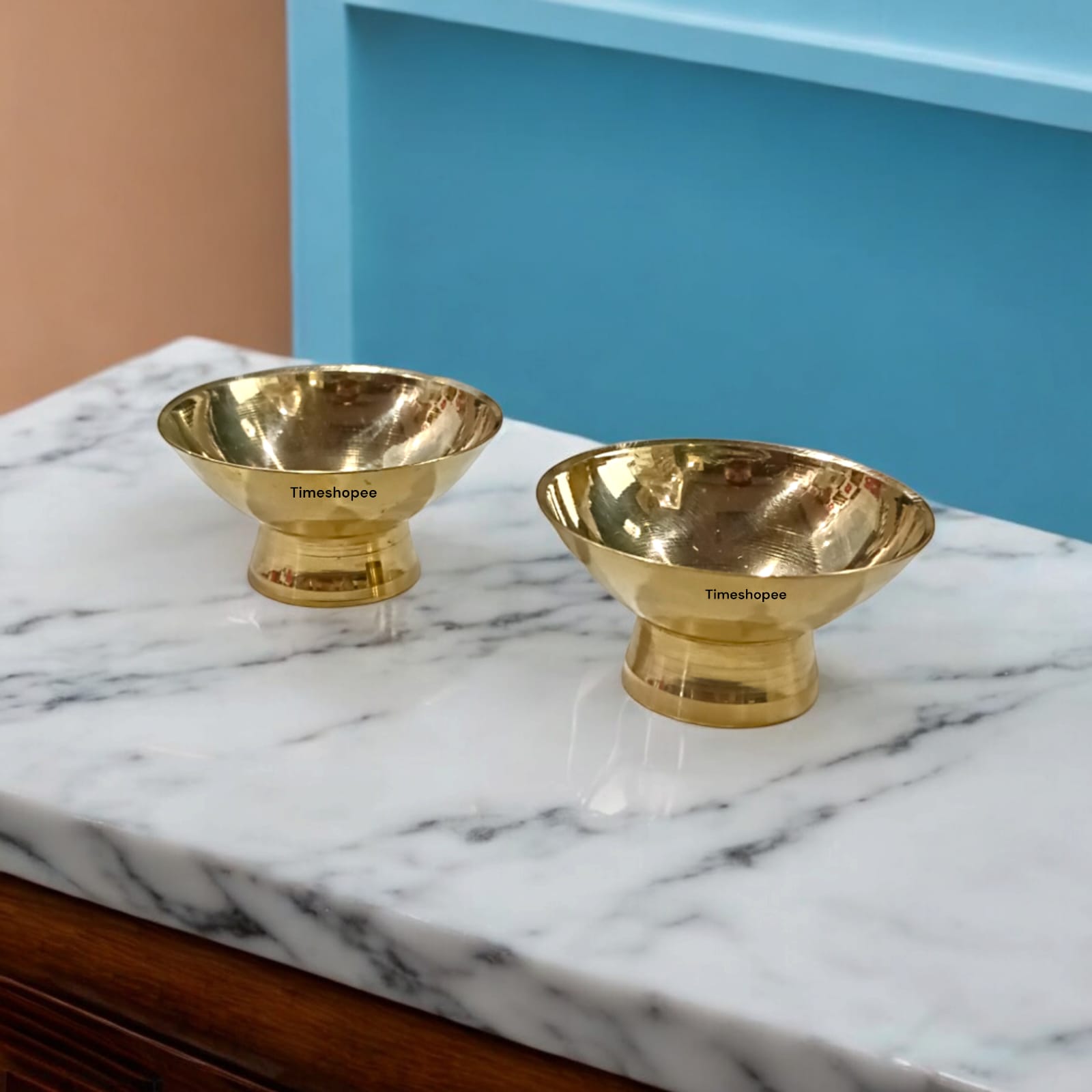 Set_of_2_brass_bowls_for_Chandan_and_Kum_Kum_perfect_for_devotional_rituals_and_elegant_altar_decoration.