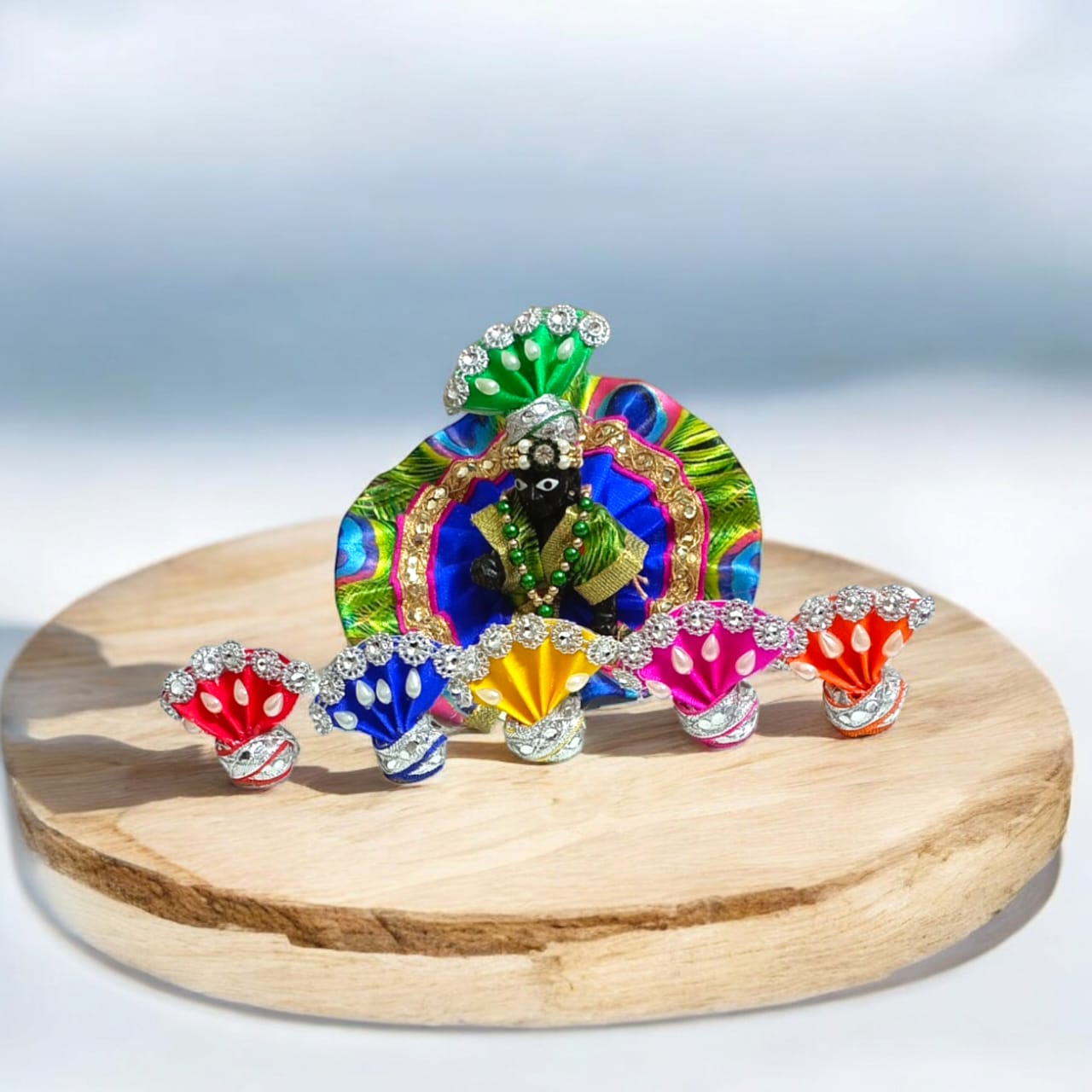 Set of 6 colorful pagdis for Laddu Gopal Size 0 No., perfect devotional headwear in vibrant red, yellow, blue, green, pink, and orange.