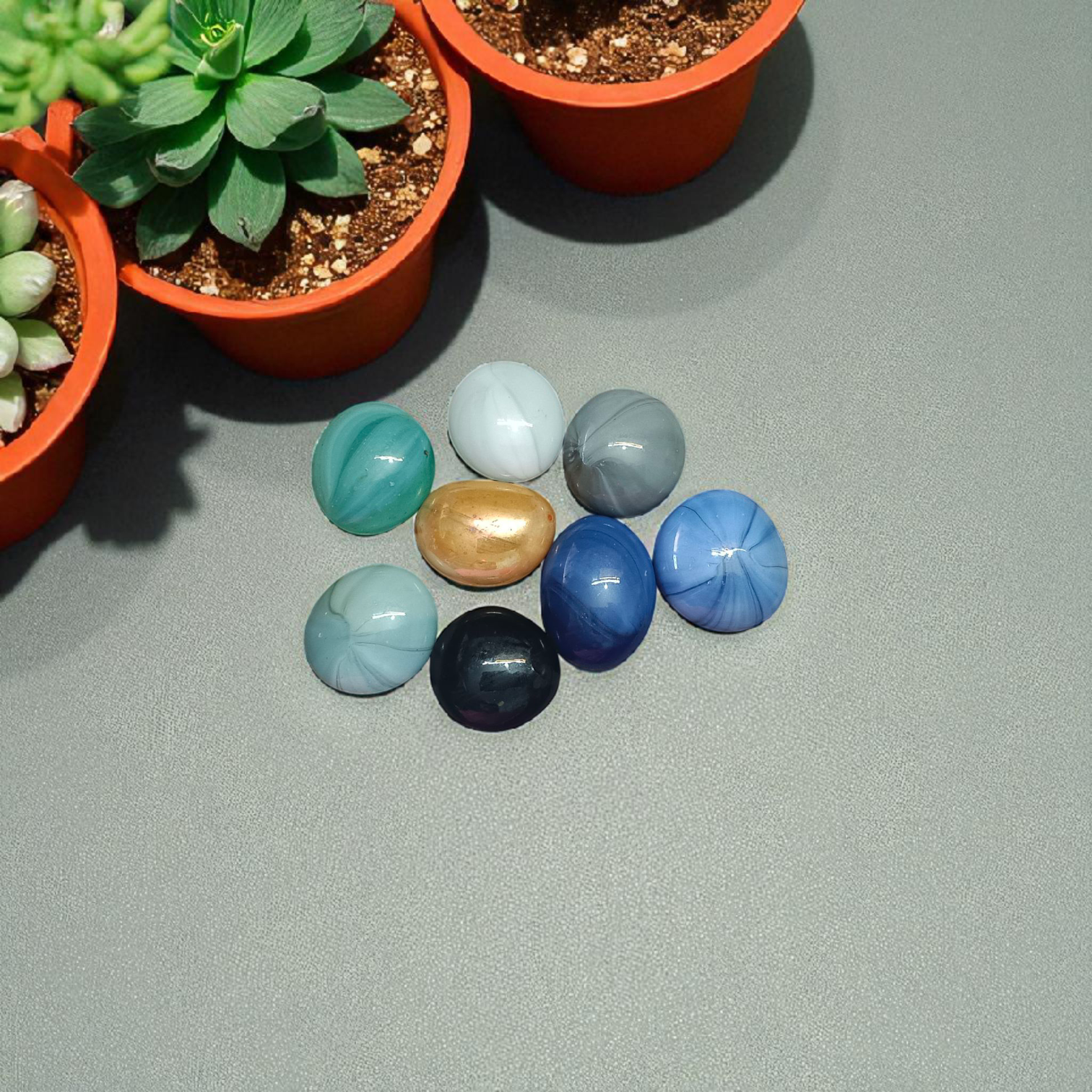 Set of 8 colorful round shiny glass pebble stones, ideal for decoration in plant pots, aquariums, vases, and home gardens