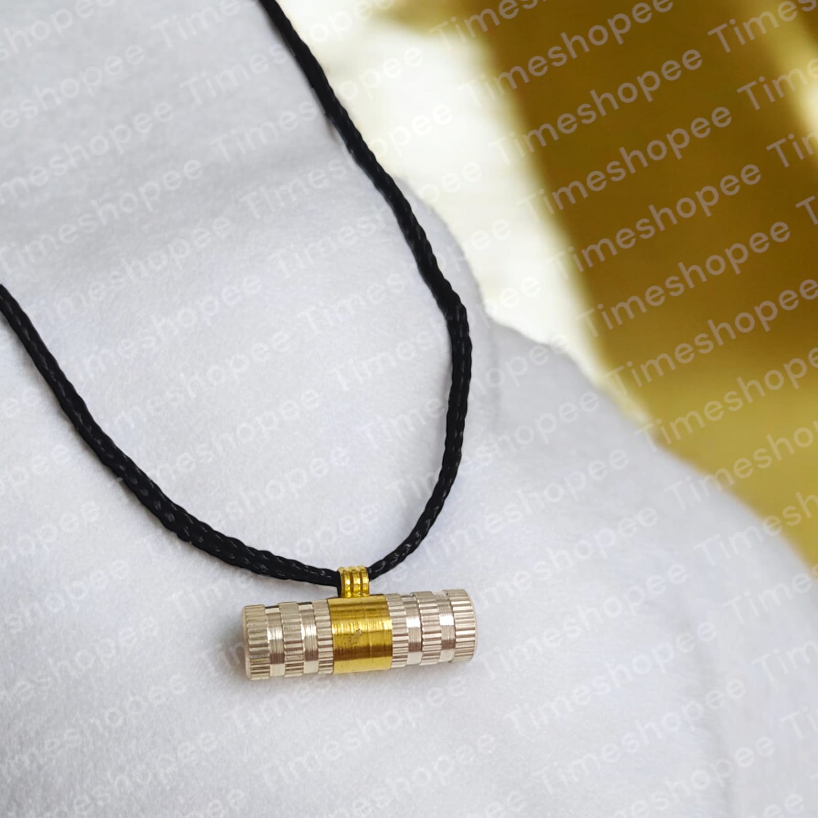 Set of Pure Brass and Silver taweezes with Bhojpatra sheet, displayed elegantly on a neutral background