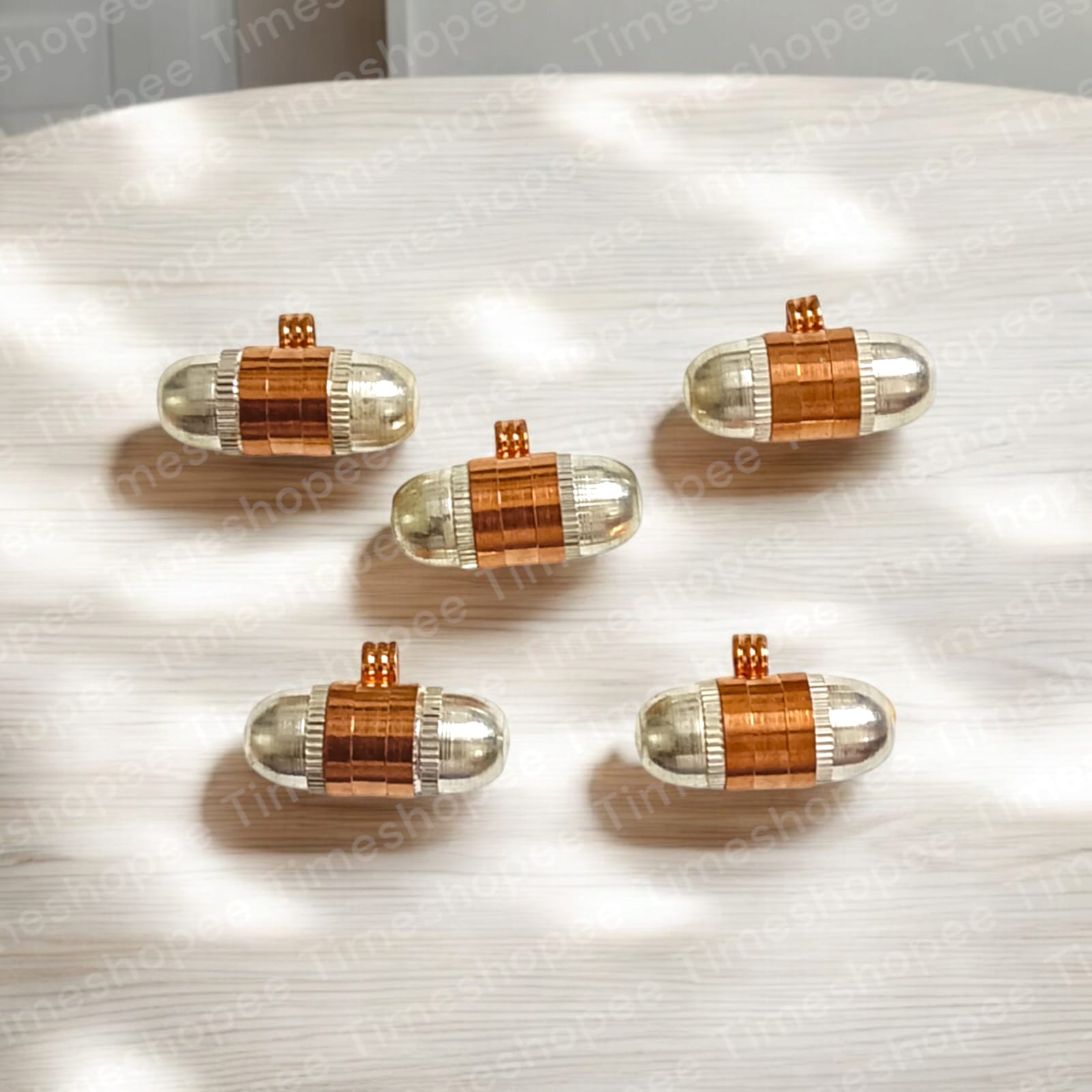 Set of Pure Copper and Silver taweezes with a Bhojpatra sheet, displayed elegantly