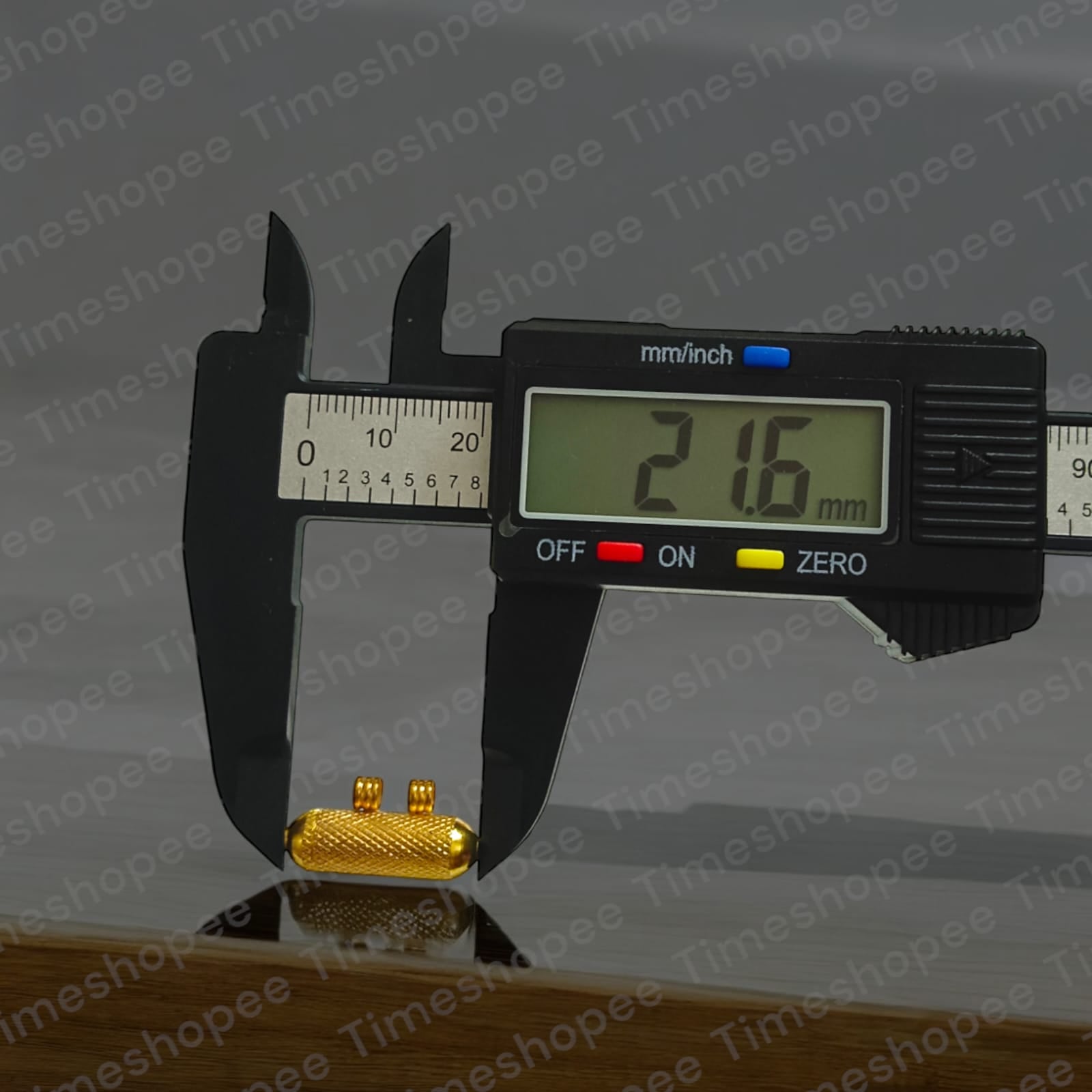 Set of Pure Golden metal taweezes with Bhojpatra sheet, displayed elegantly on a neutral background