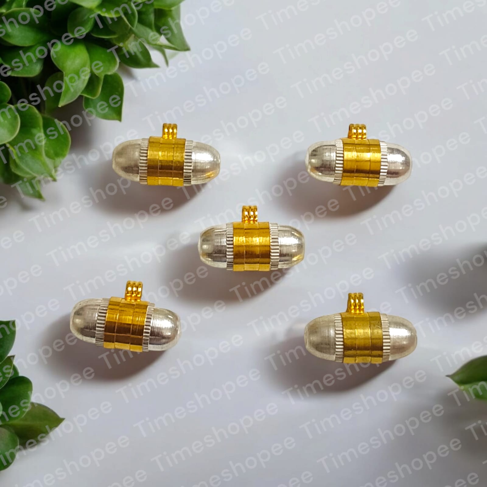 Set of five Pure Brass and Silver Metal Taweez amulets, 22mm each, with a free Bhojpatra sheet. The taweez feature golden and silver colors and an easily openable design.