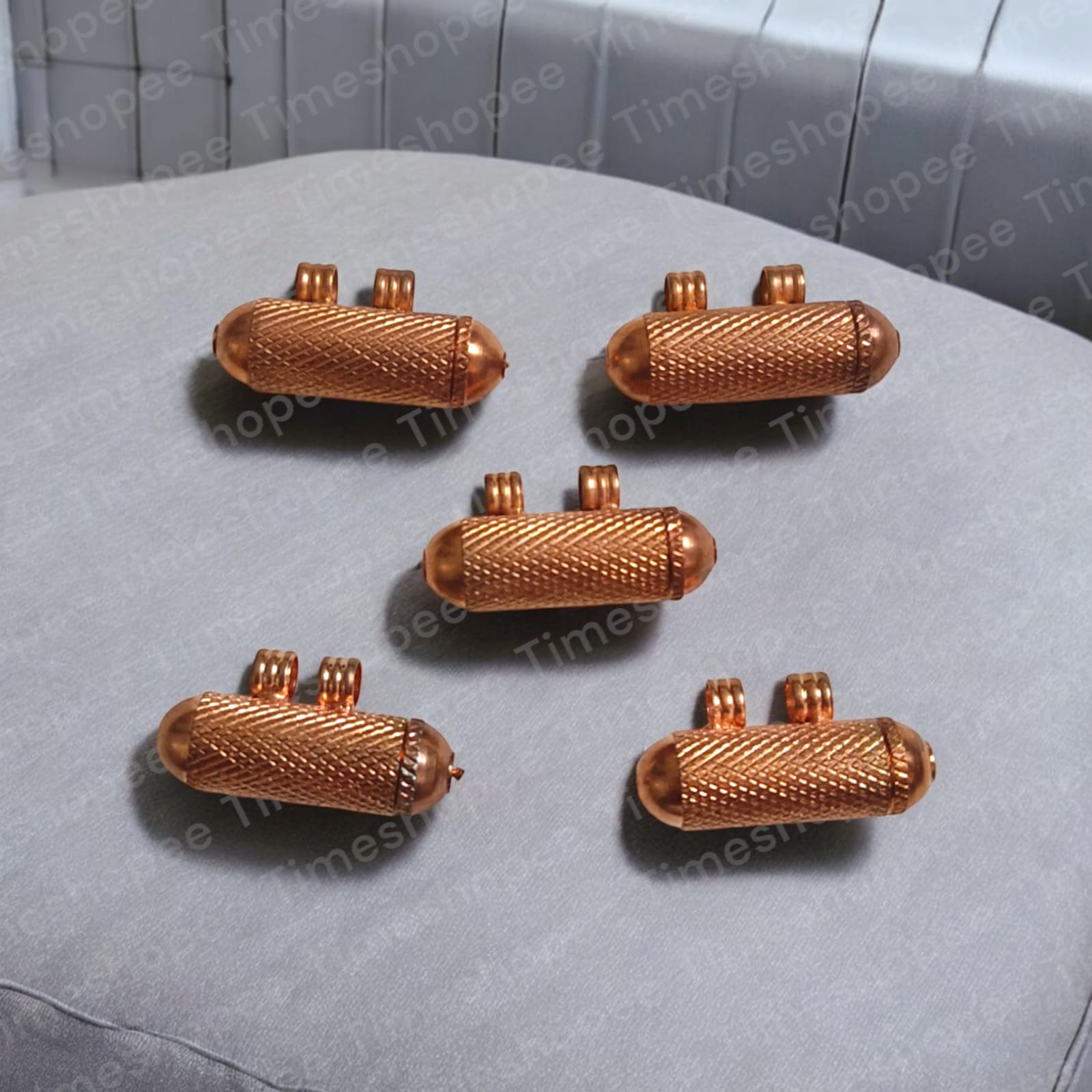 Set of five Pure Copper Metal Taweez amulets, each 21.3mm in diameter, with a free Bhojpatra sheet. Features a warm copper color and easily openable design.