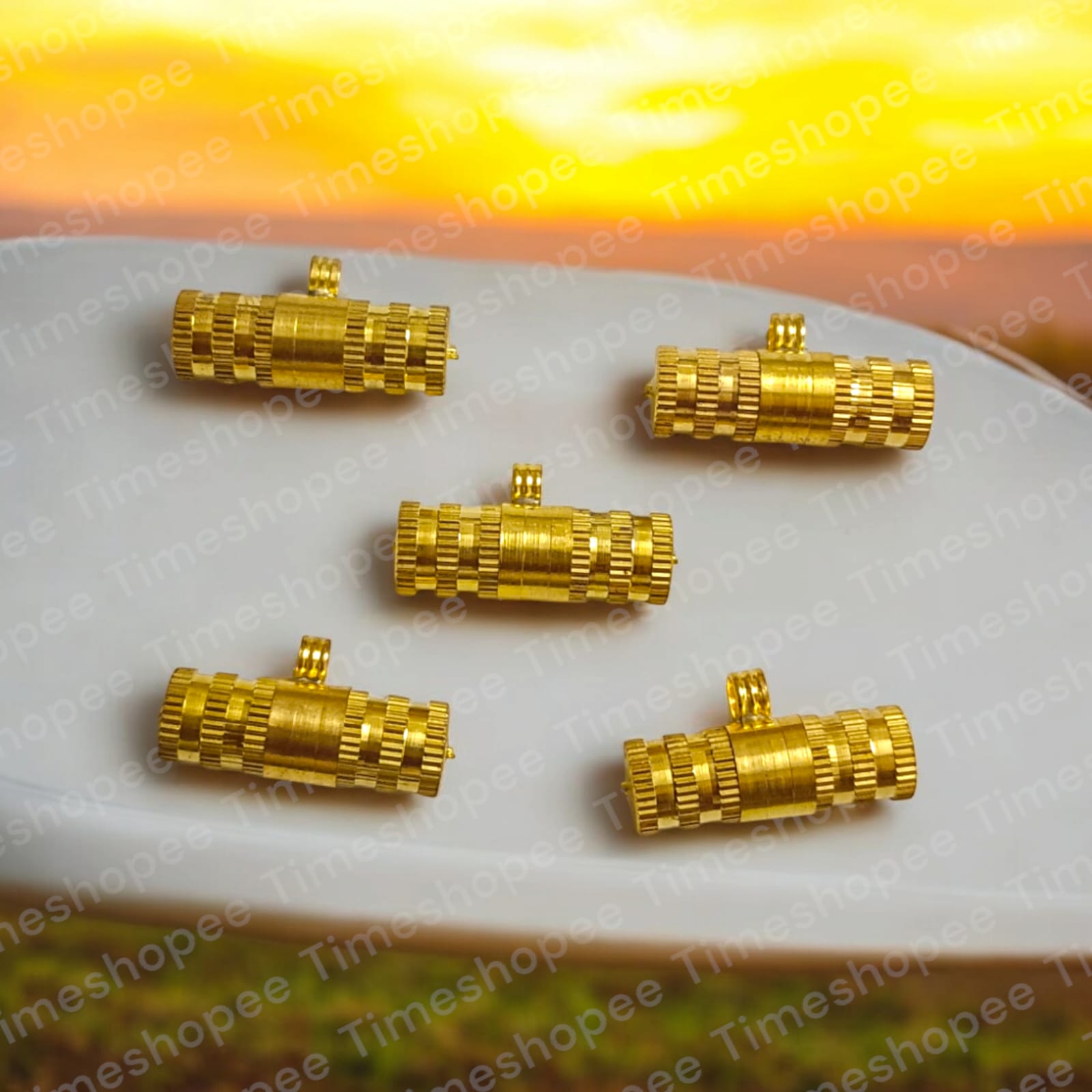 Set of five Pure Golden Metal Taweez amulets, each 21mm in diameter, with a free Bhojpatra sheet. Features a radiant golden color and easily openable design.