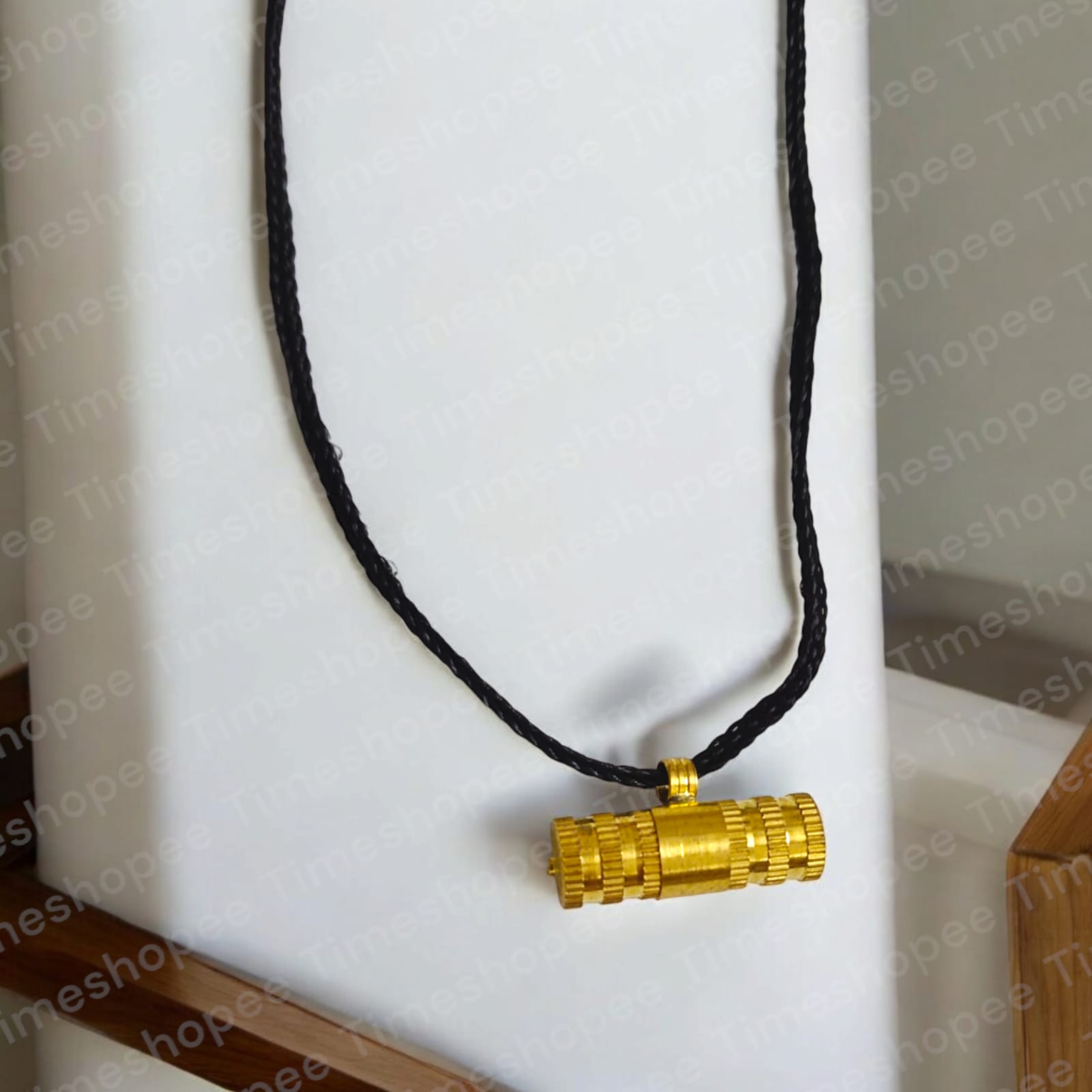 Set of five Pure Golden Metal Taweez amulets, each 21mm in diameter, with a free Bhojpatra sheet. Features a radiant golden color and easily openable design.